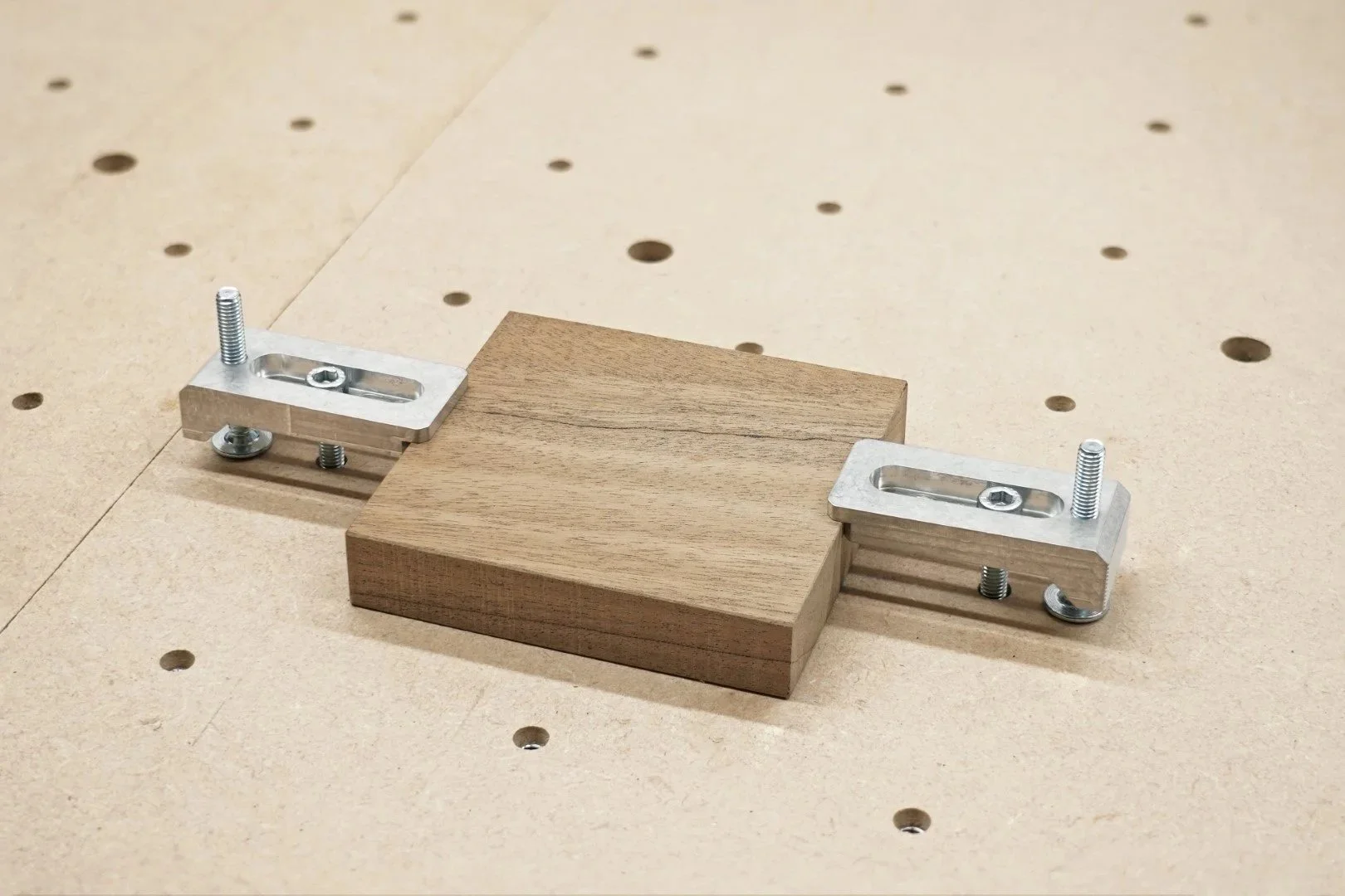 adjustable top clamps / strap clamps workholding 20mm walnut on a desktop CNC router