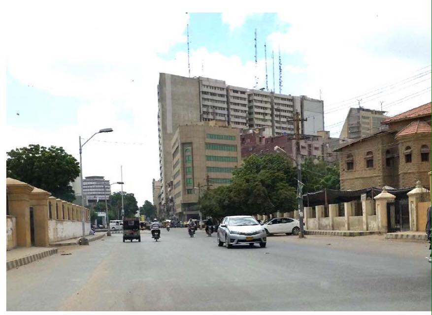  The image shows the width of the road and two important structures on both sides, D.J Science/ Principal Residence 