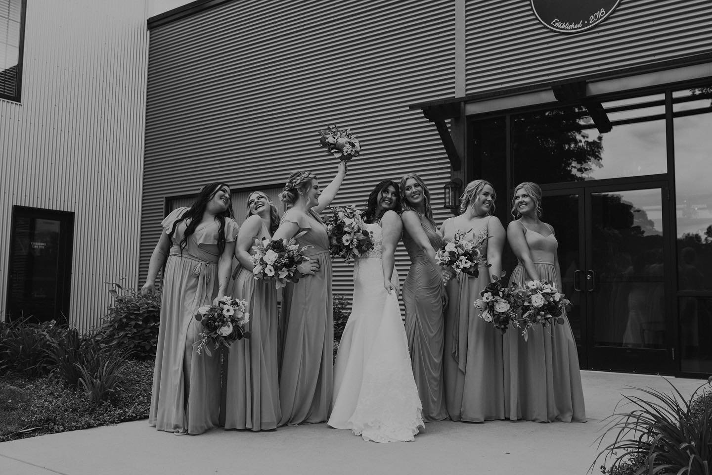 bridal party with large floral bouquet.jpg