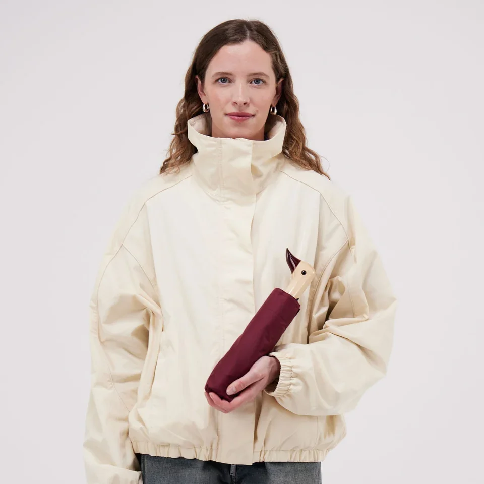 original-duckhead-cherry-duck-umbrella-being-held-by-model-closed-square-1200-x-1200.jpg.webp