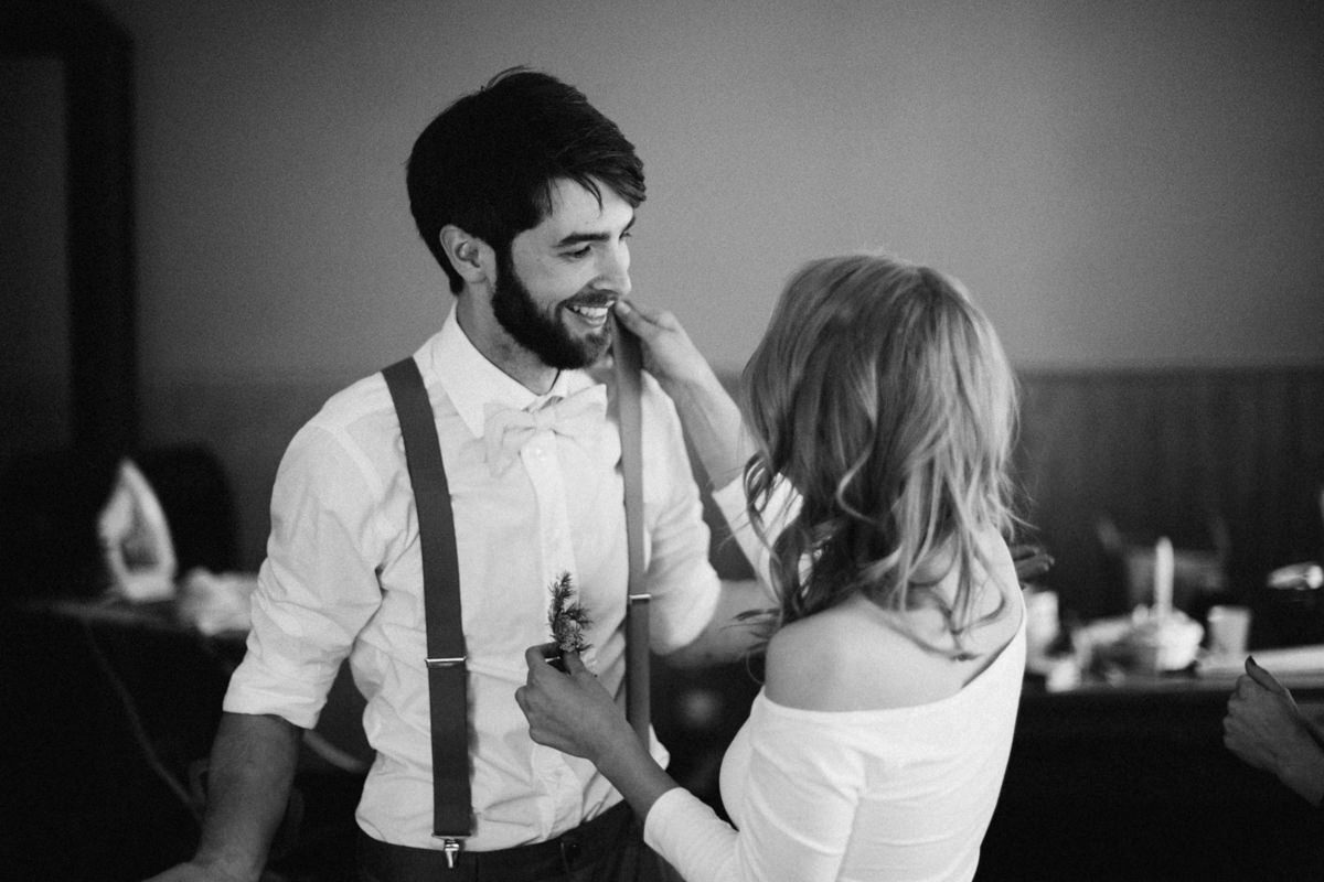 bride helping her future husband