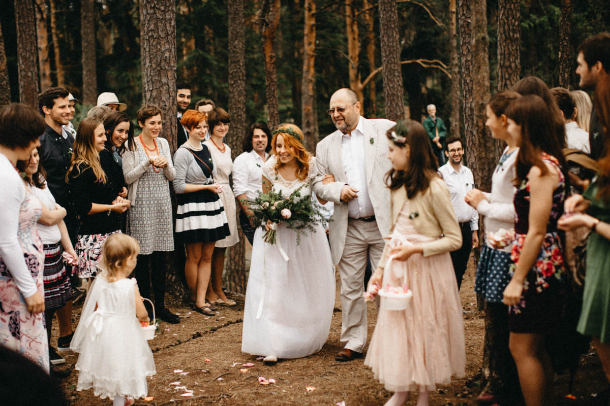 friends cheering up the bride and her father
