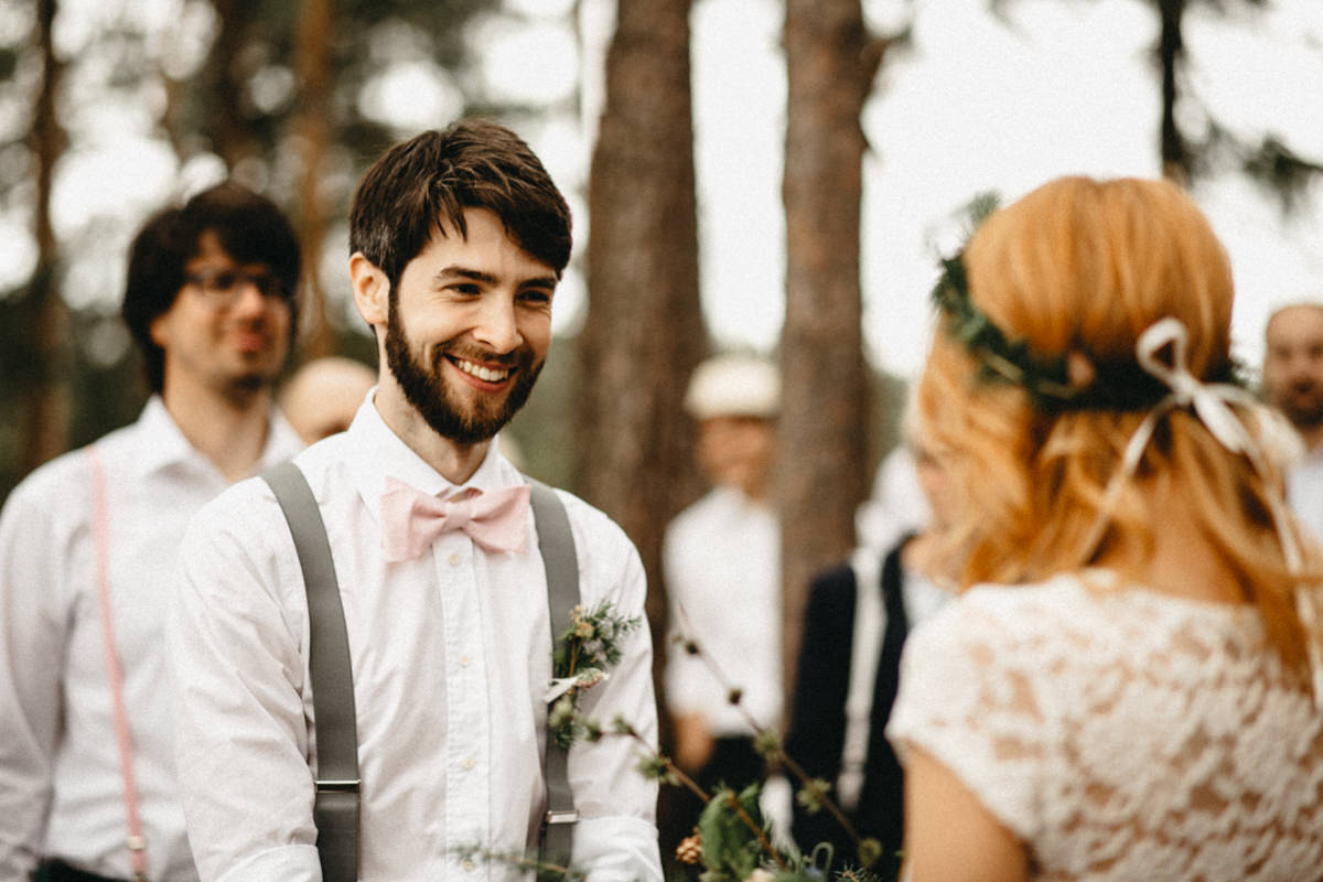 groom smiling at his future wife