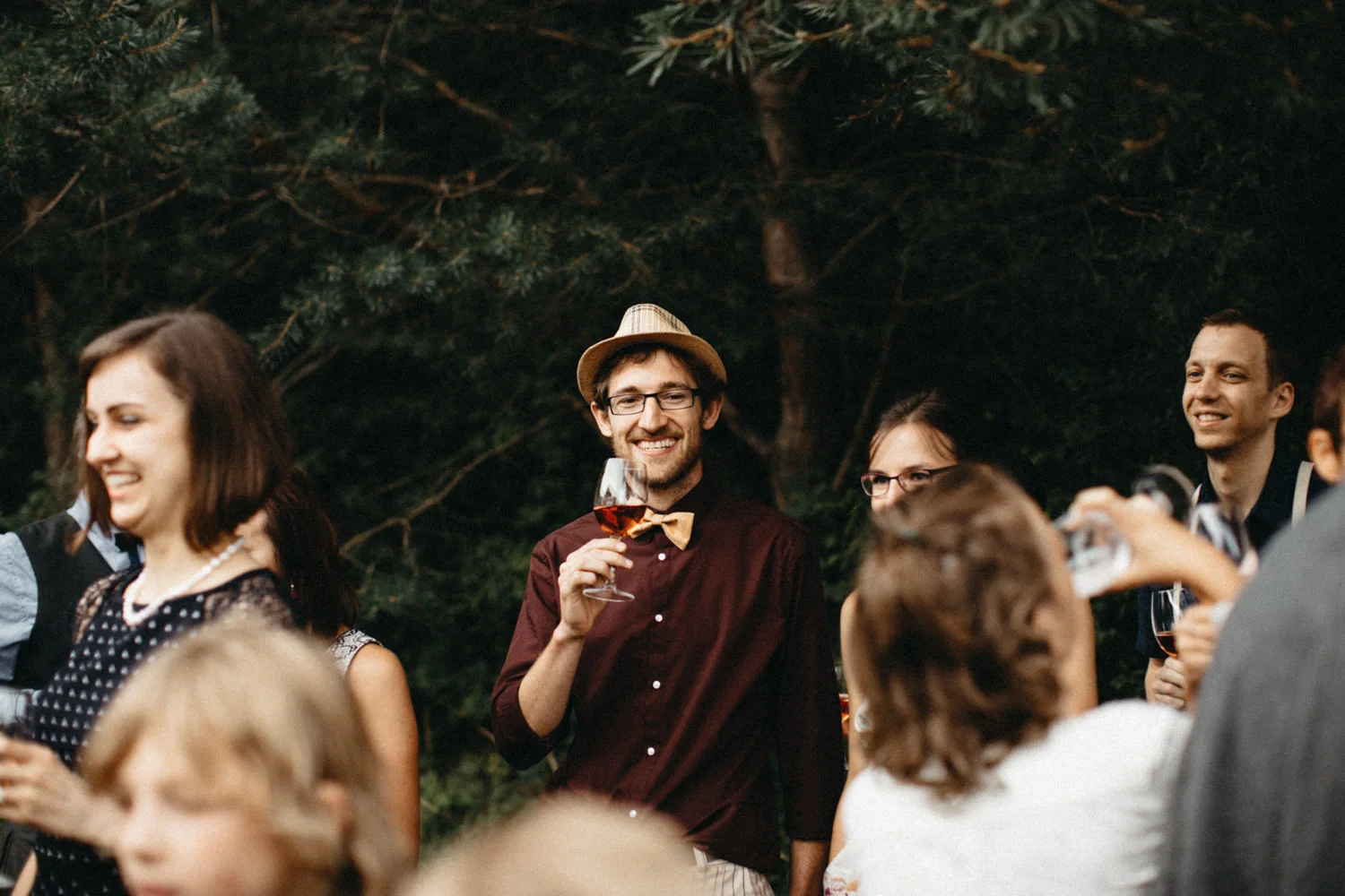 guests cheering for the couple