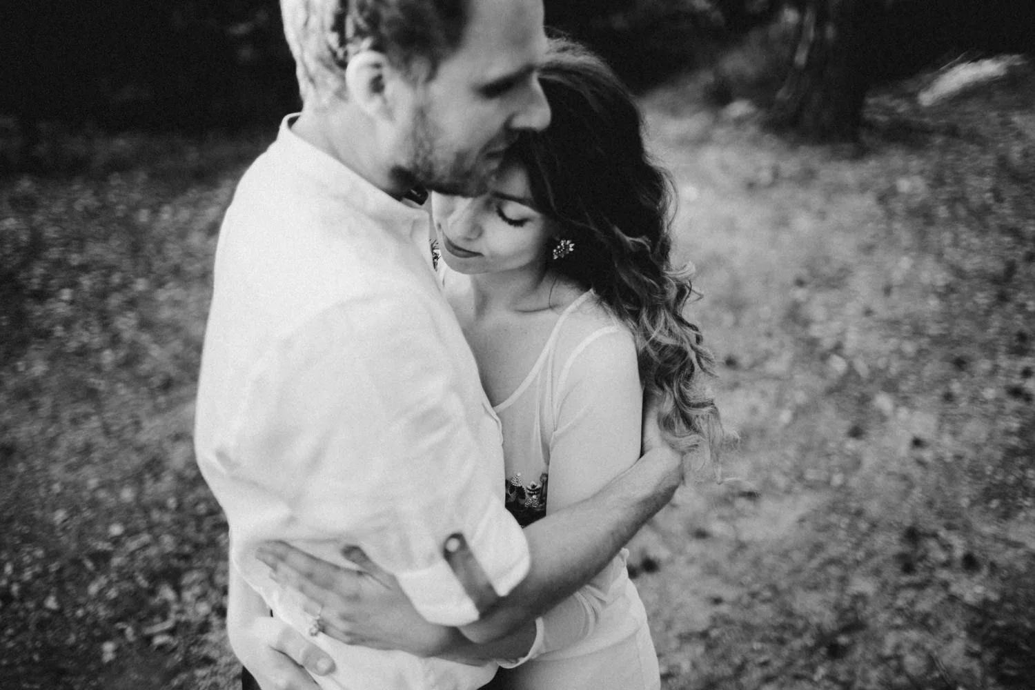 bride and groom hugging