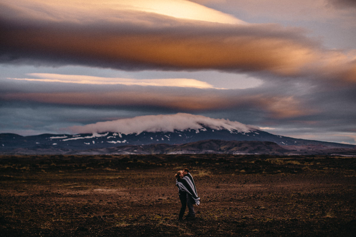 couple and a volcano