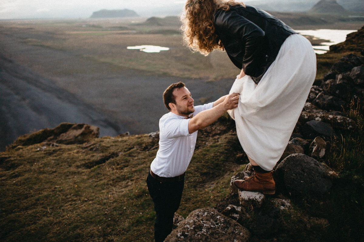 groom helping the bride