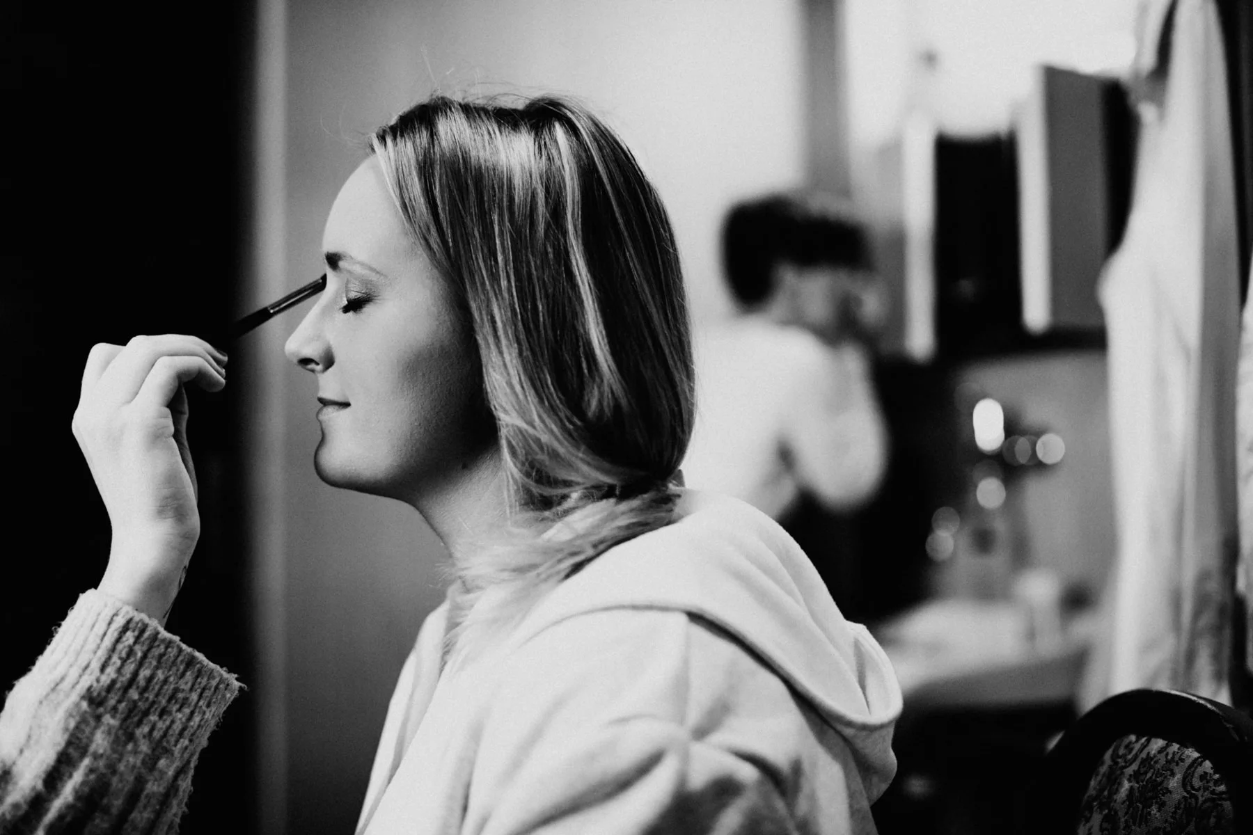bride getting her make up done
