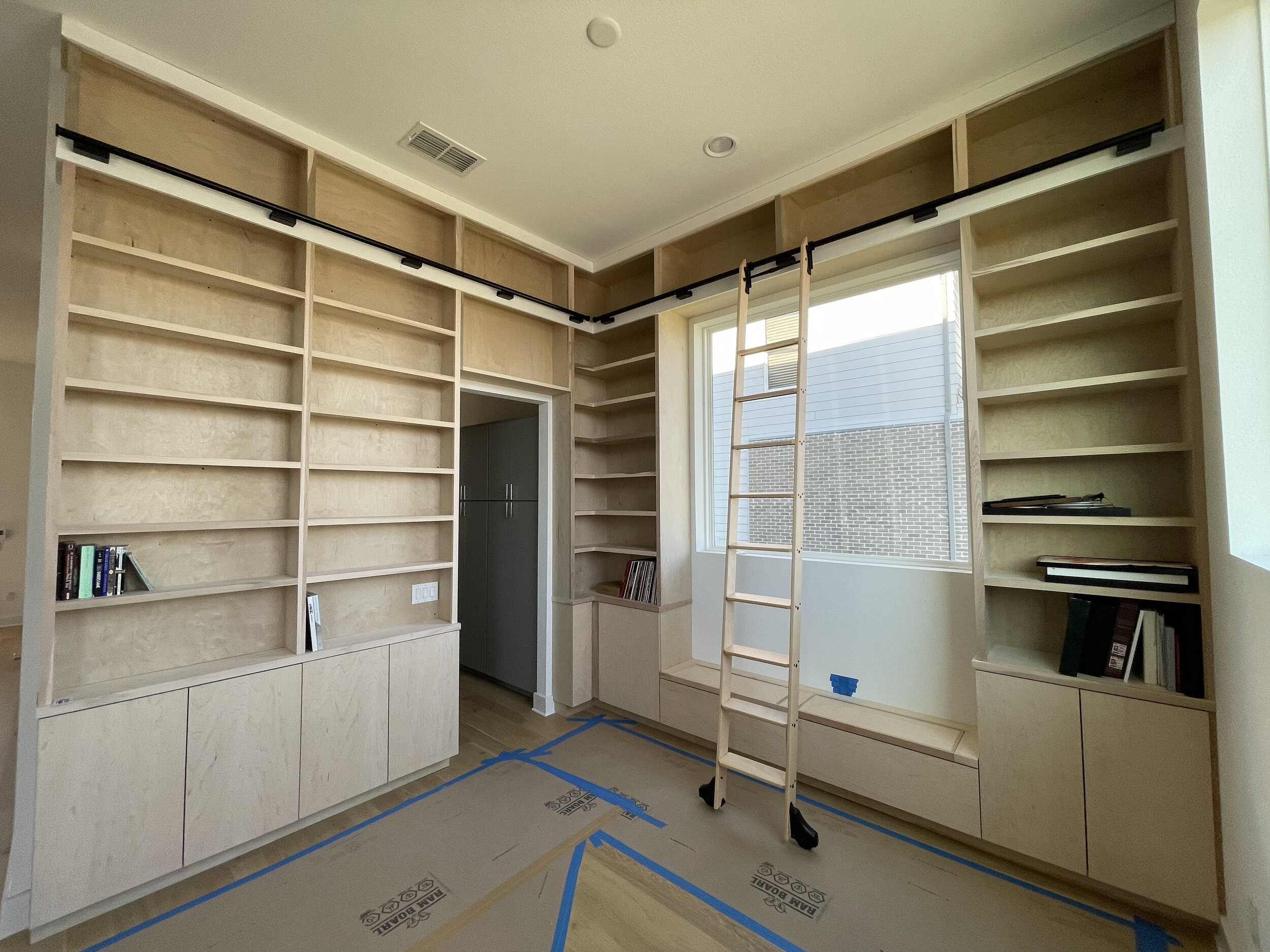 Built-In Bookcases w/ Rolling Library Ladder (WIP)