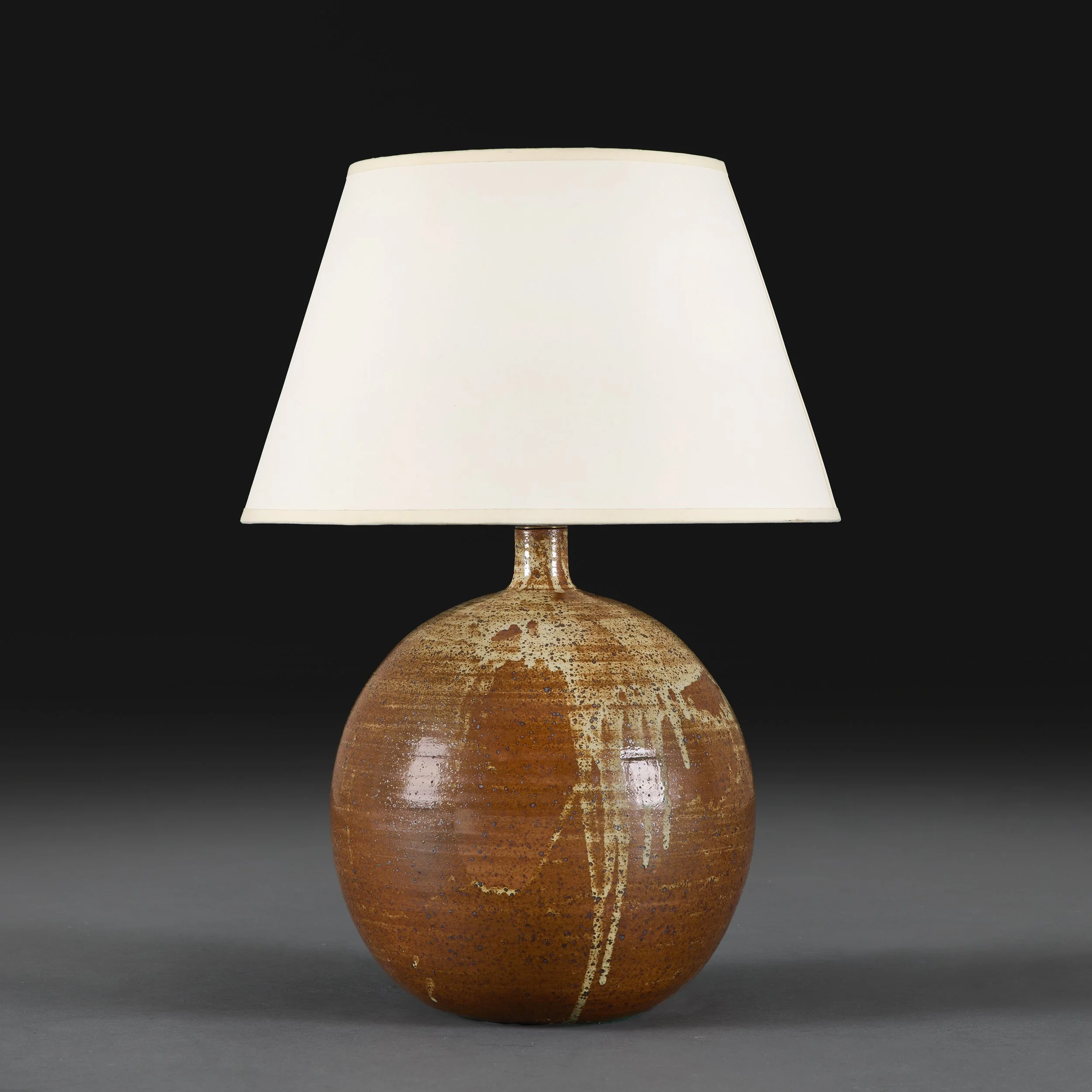 A FRENCH ART POTTERY TERRACOTTA LAMP