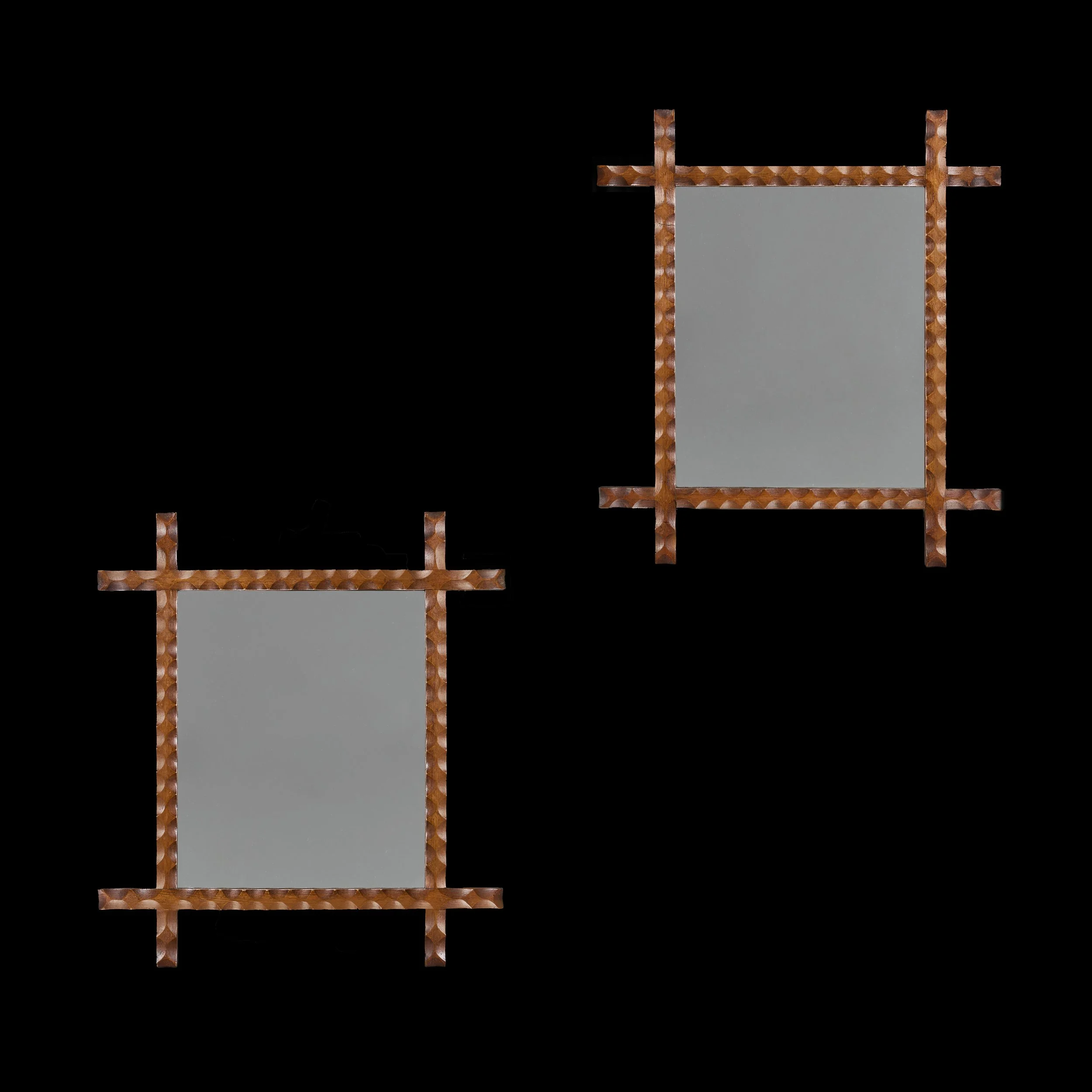 A PAIR OF 19TH CENTURY CARVED OAK MIRRORS