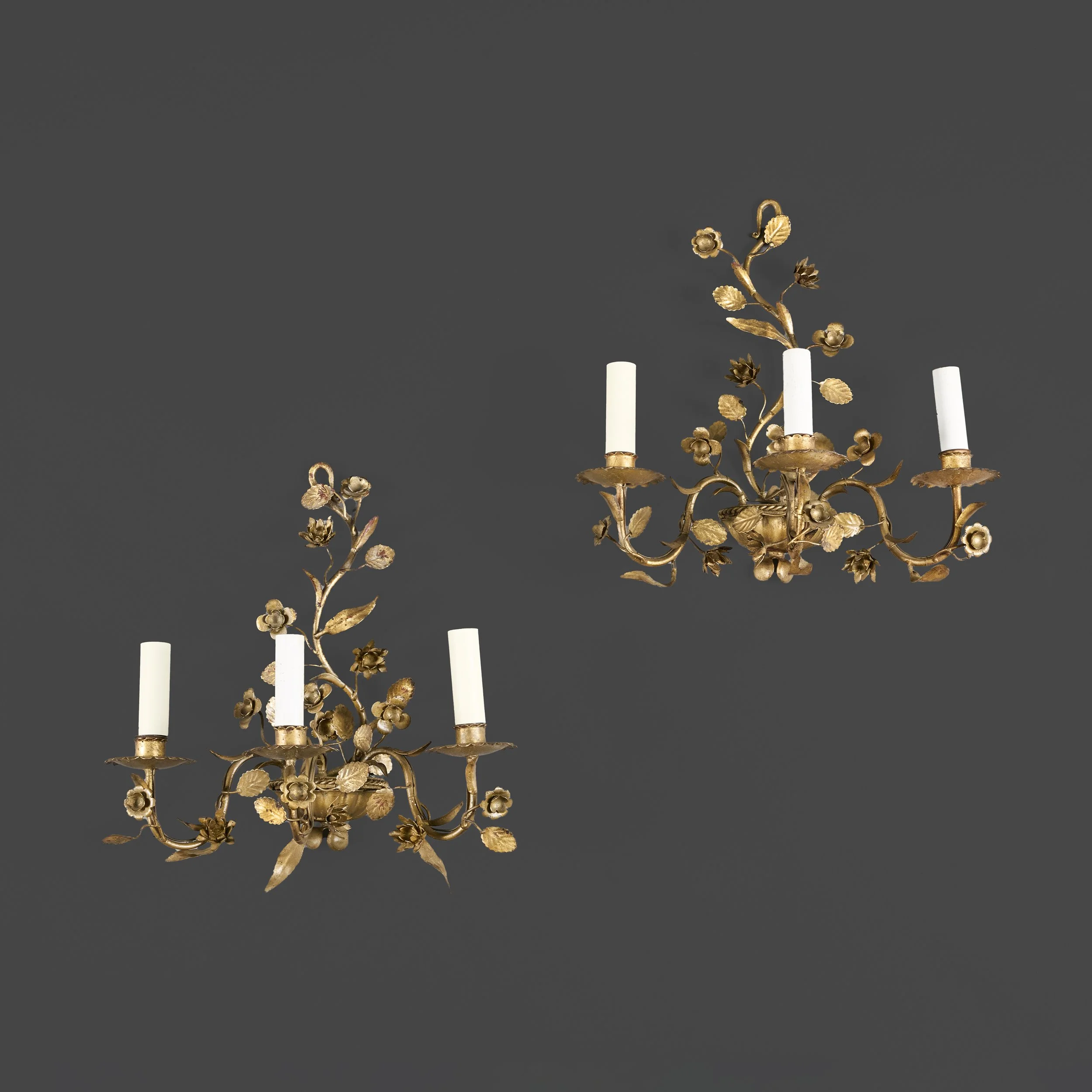 A PAIR OF FRENCH 20TH CENTURY TOLE FLORAL WALL LIGHTS