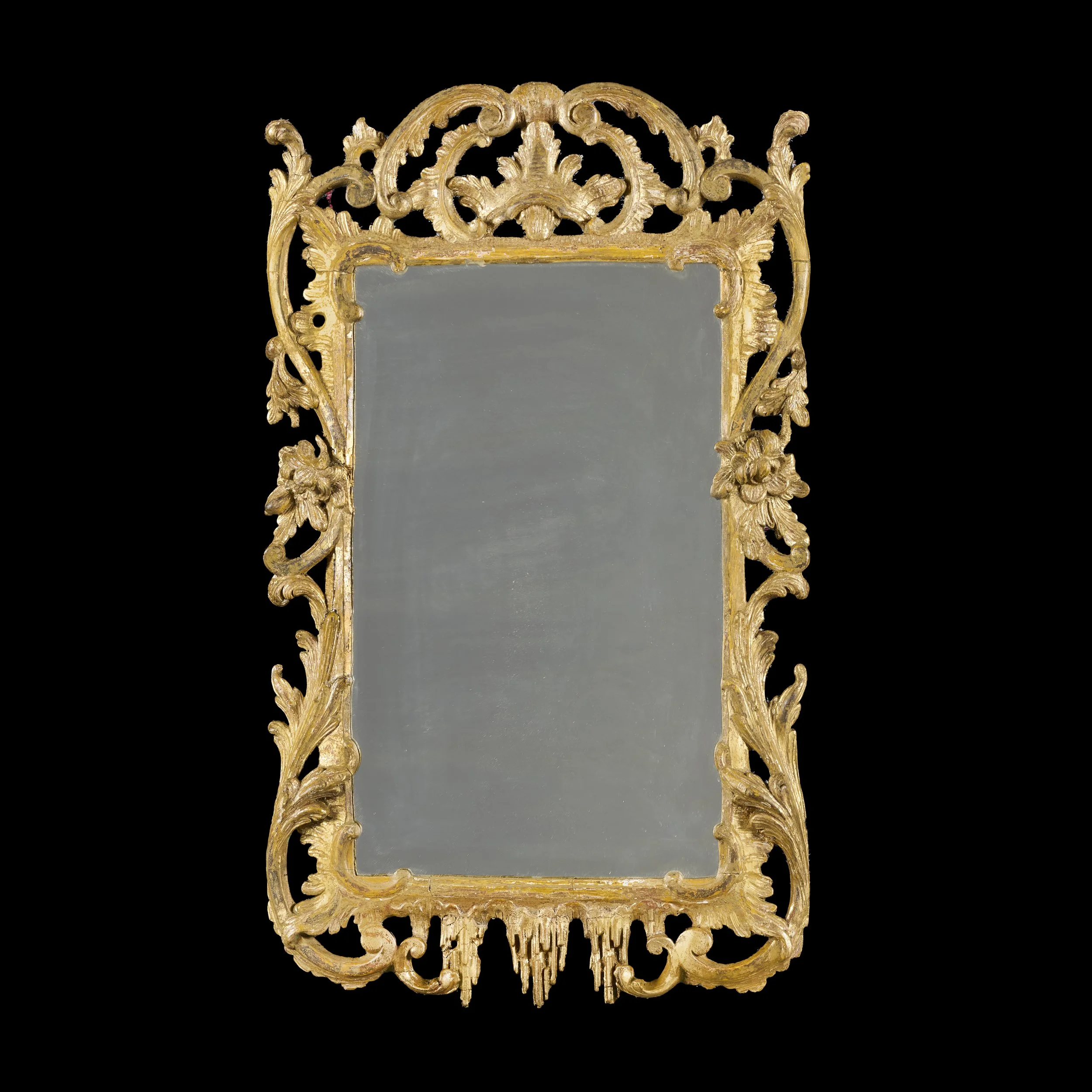 A MID 18TH CENTURY ROCOCO GILTWOOD MIRROR