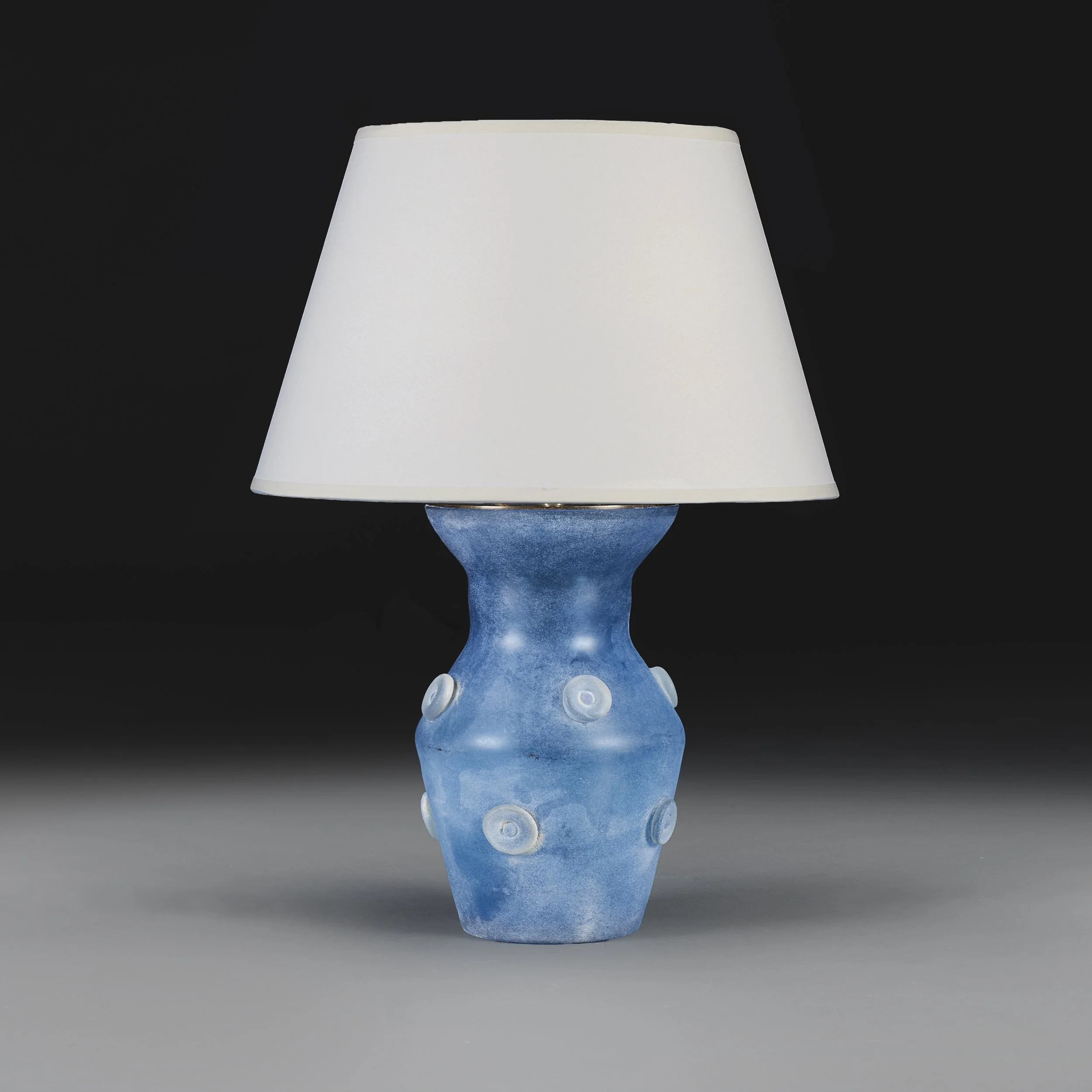 A BLUE ART GLASS VASE AS A LAMP