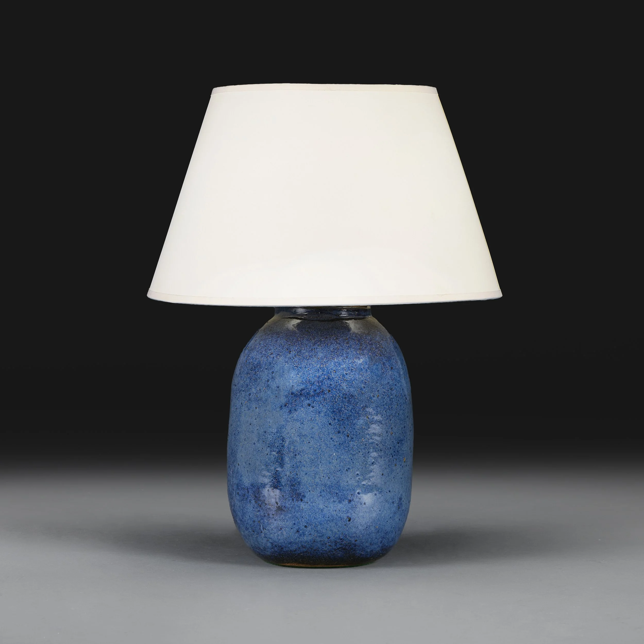 A BLUE SPECKLED ART POTTERY LAMP