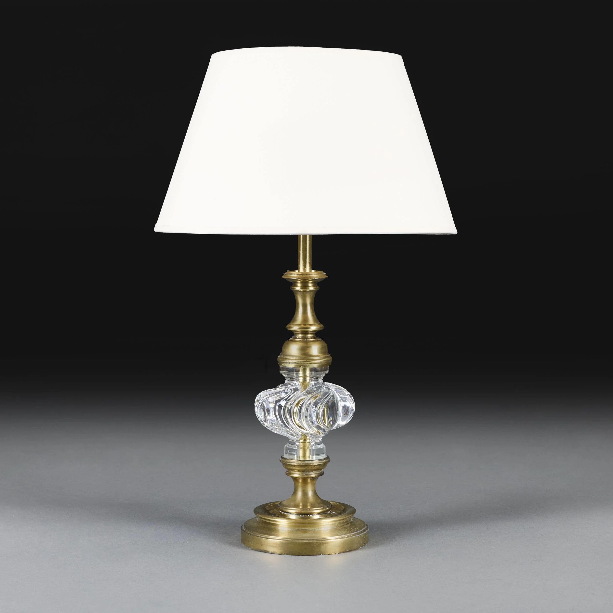 A BACCARAT GLASS AND BRASS LAMP
