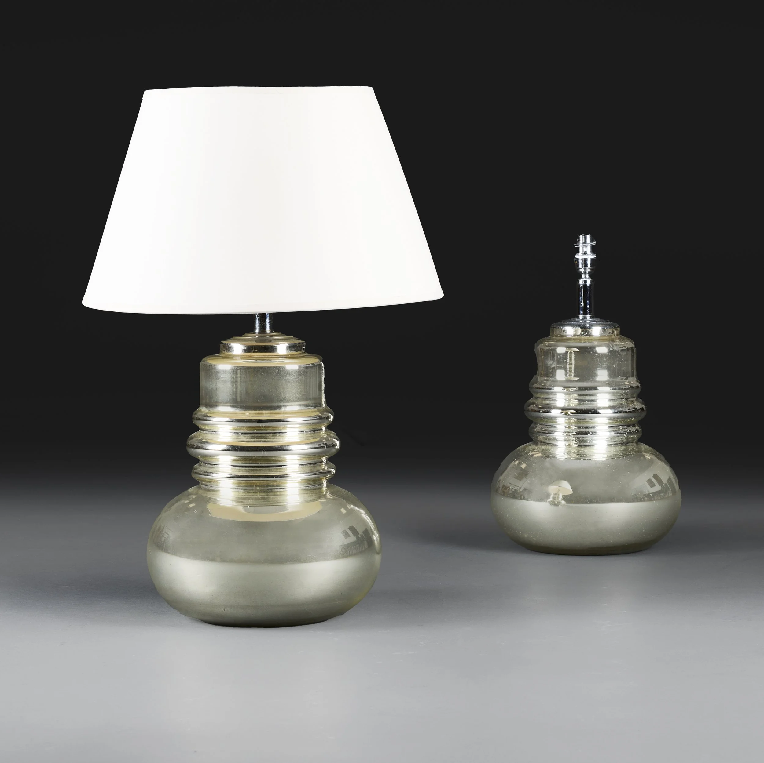 A PAIR OF MERCURY GLASS LAMPS