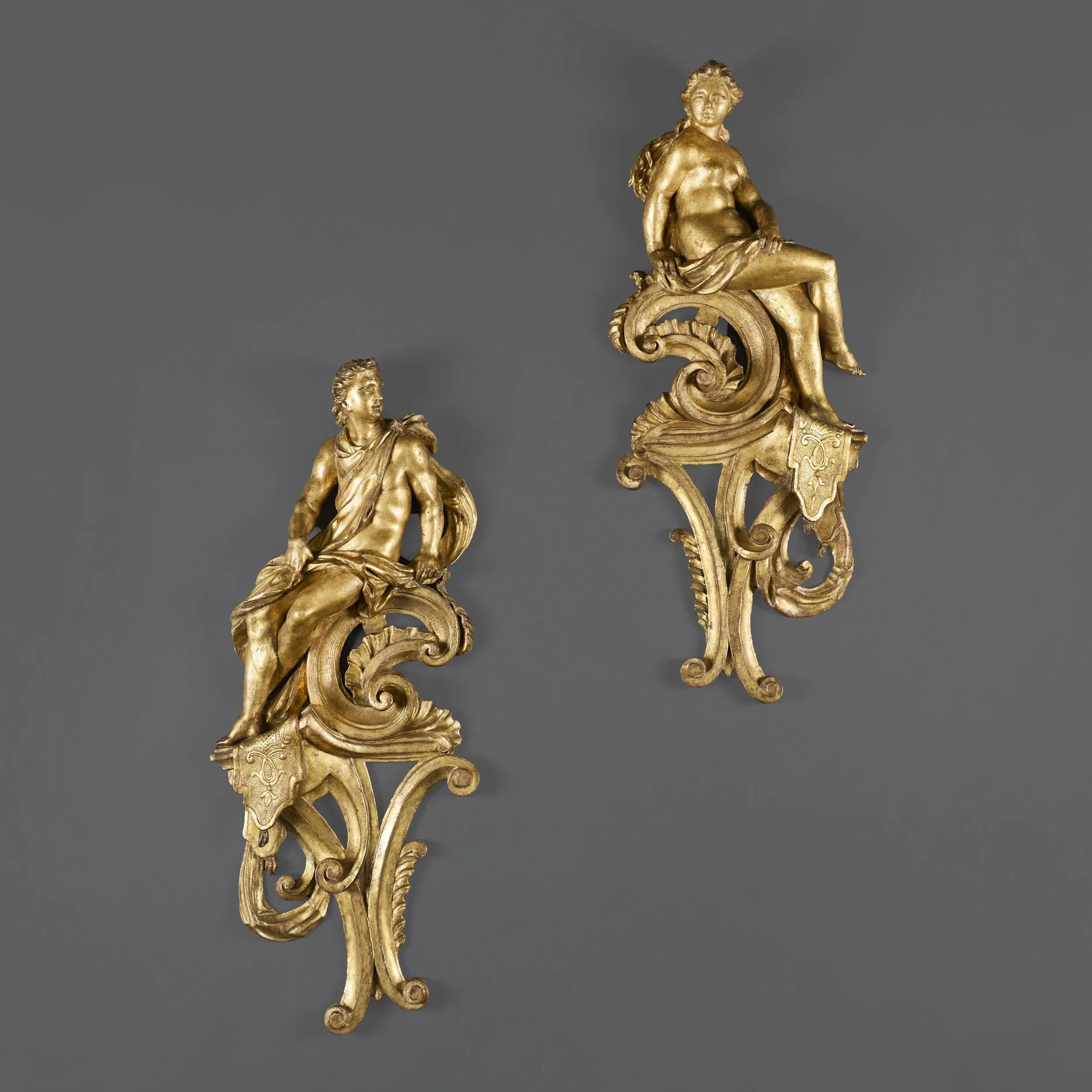 A FINE PAIR OF ARCHITECTURAL TERMS DEPICTING MARS AND NEPTUNE