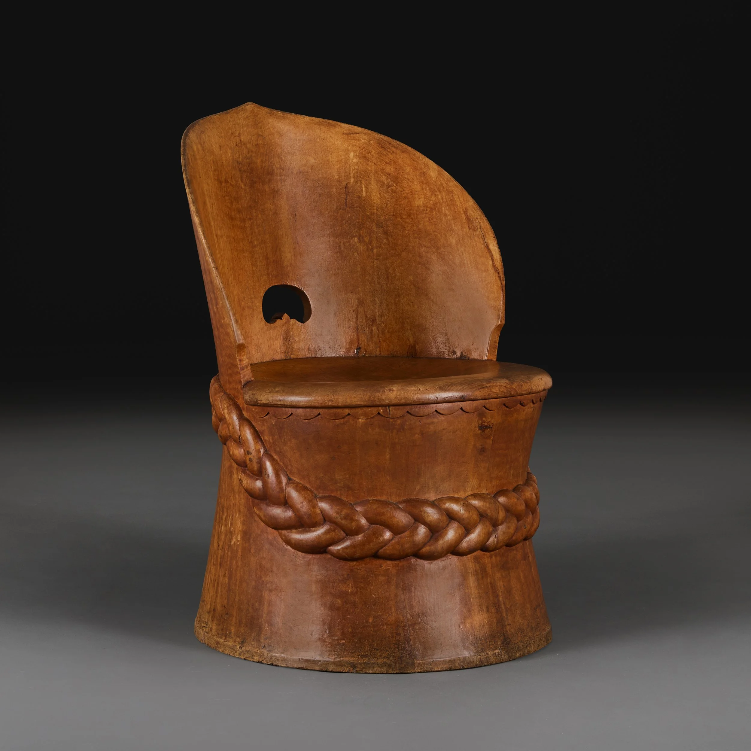 A 19TH CENTURY AUSTRIAN DUG OUT CHAIR