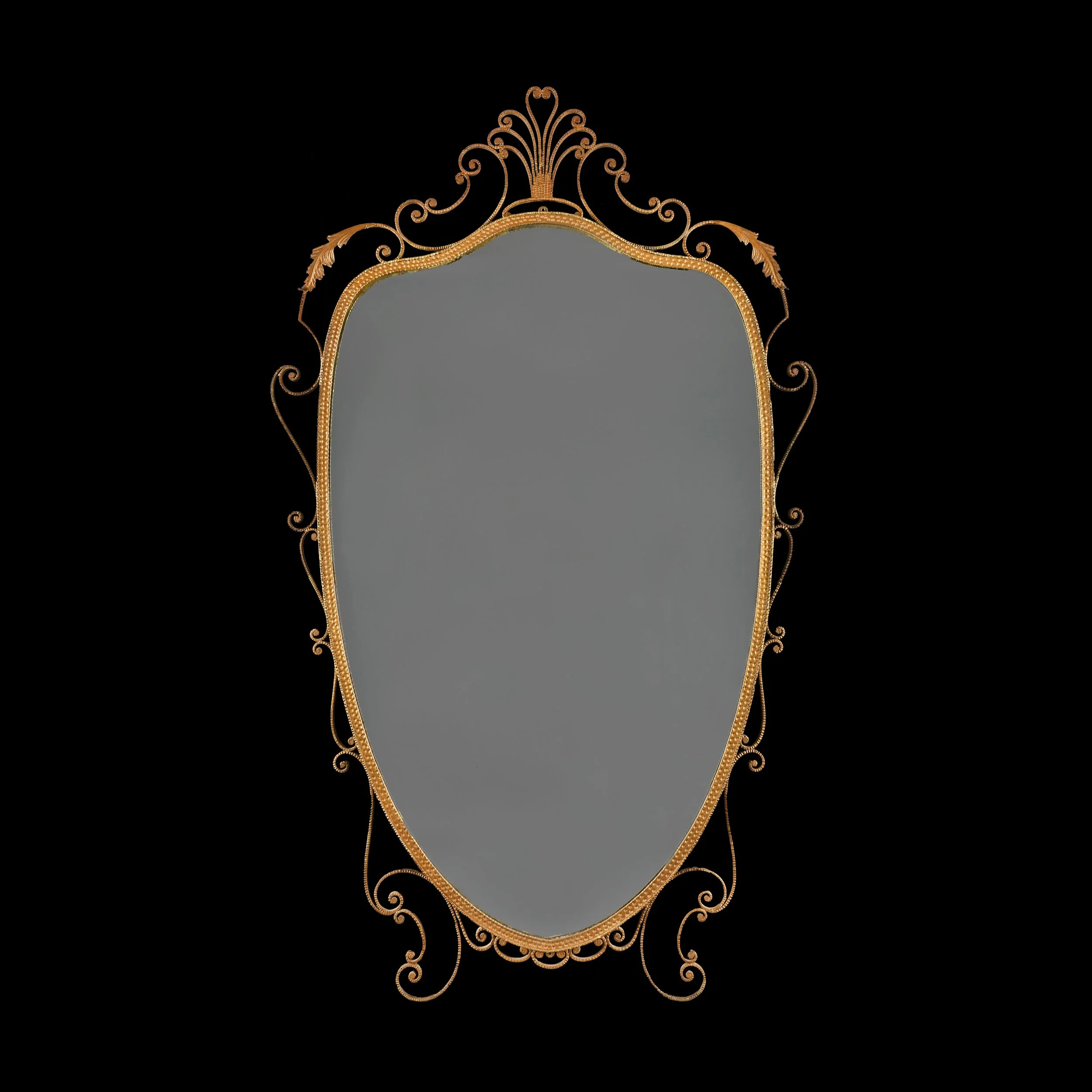 AN ITALIAN MID-CENTURY SHIELD MIRROR
