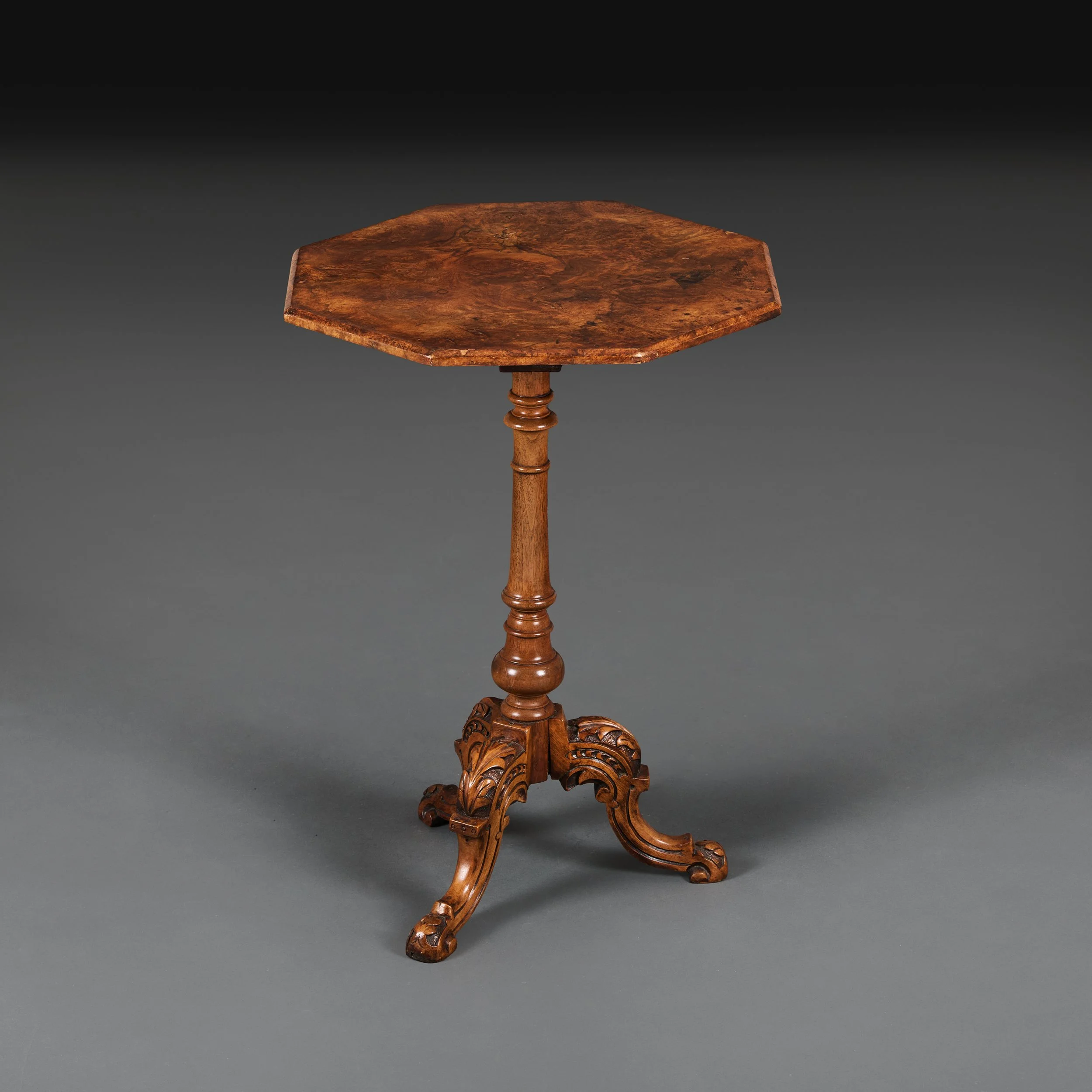 AN OCTAGONAL BURR WALNUT OCCASIONAL TABLE