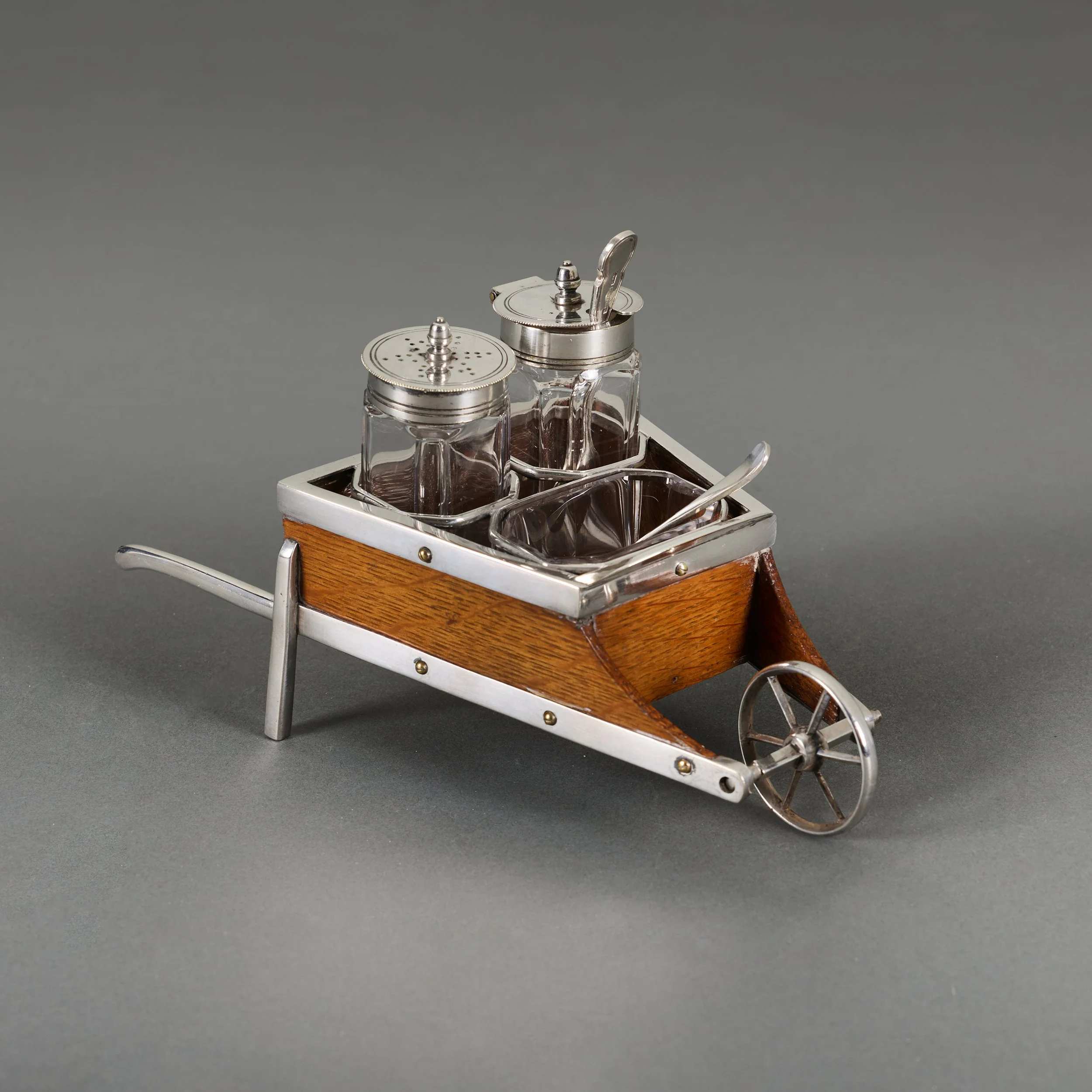 AN EDWARDIAN SILVER CRUET SET