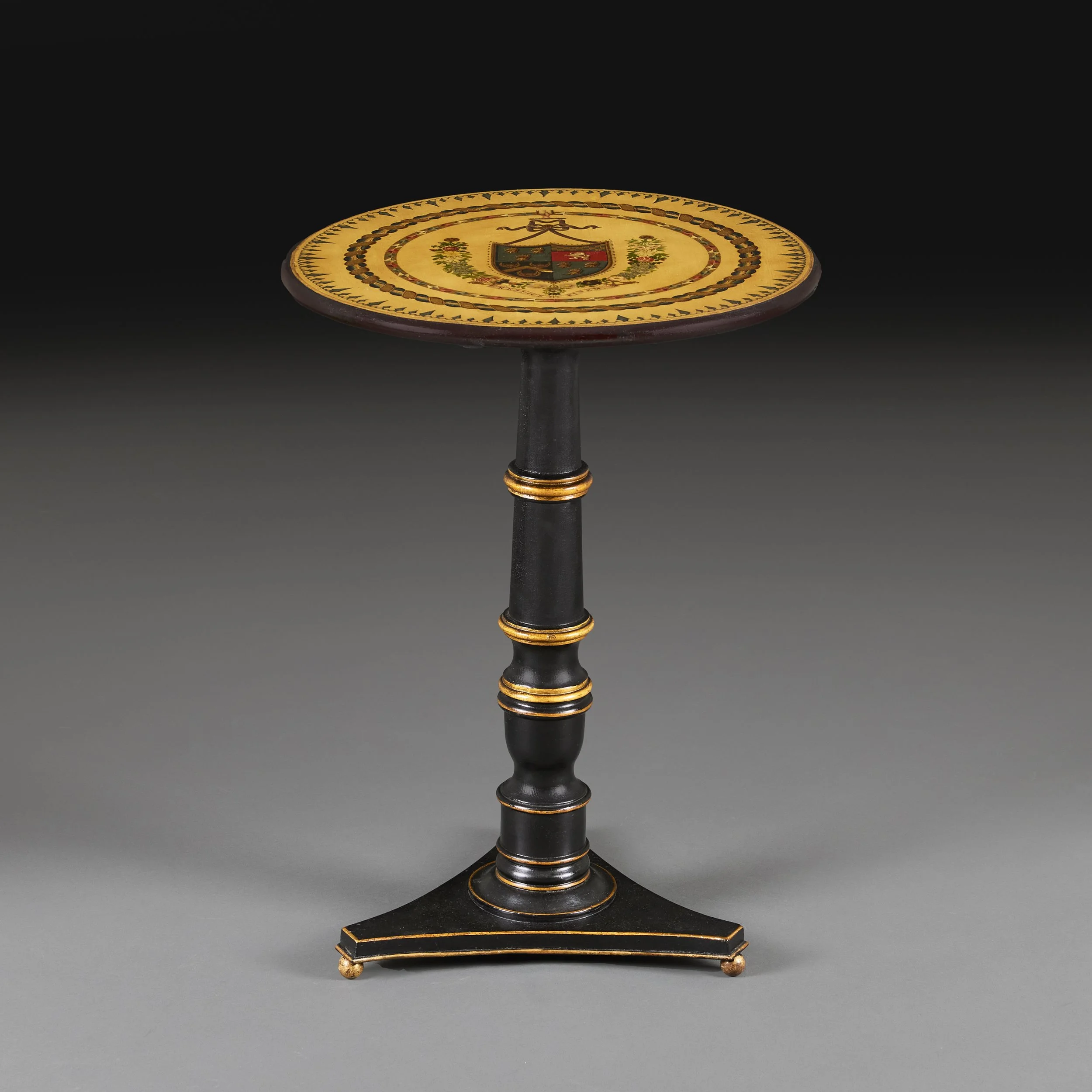 A FINE REGENCY PAINTED ARMORIAL TABLE