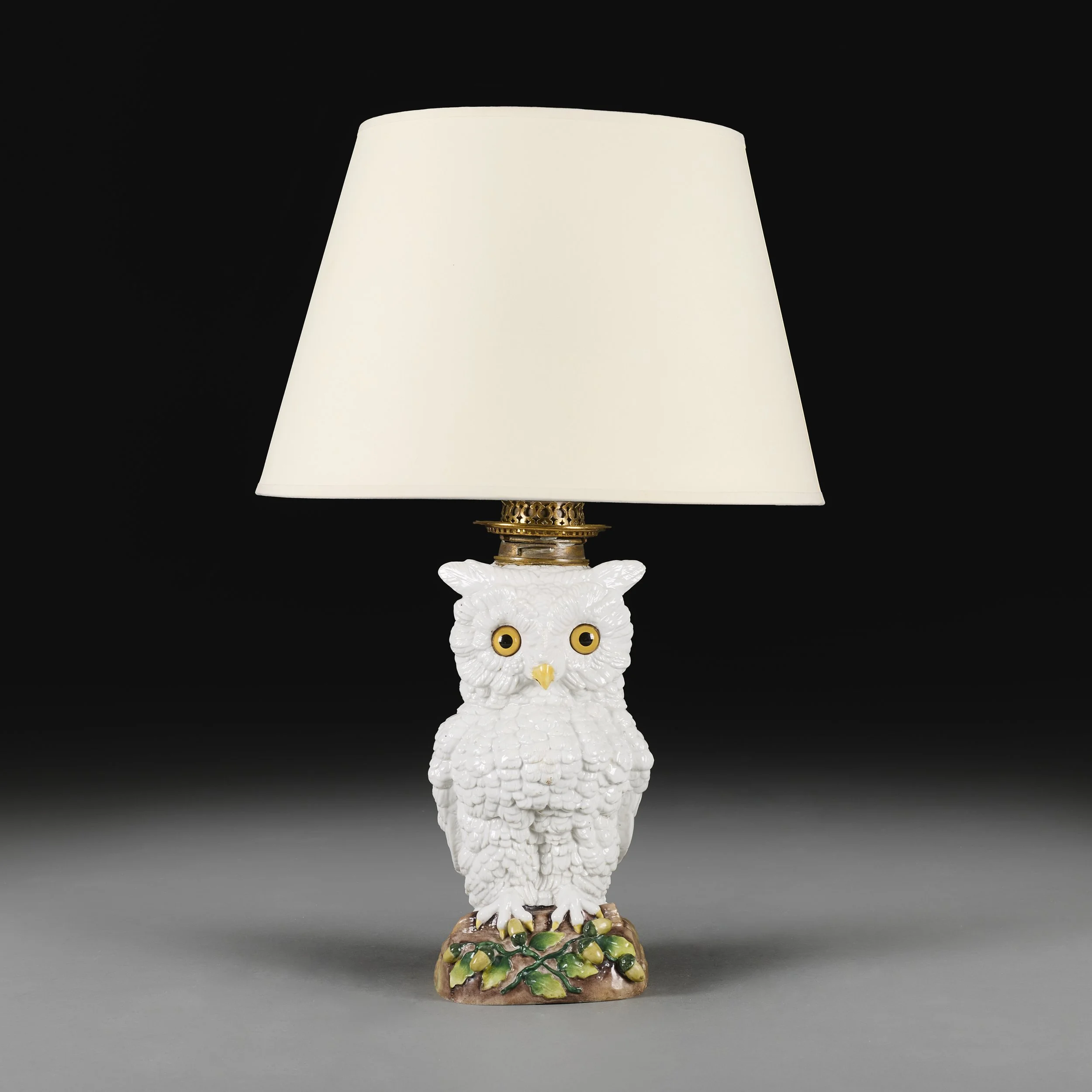 AN OVERSCALE PORCELAIN OWL LAMP