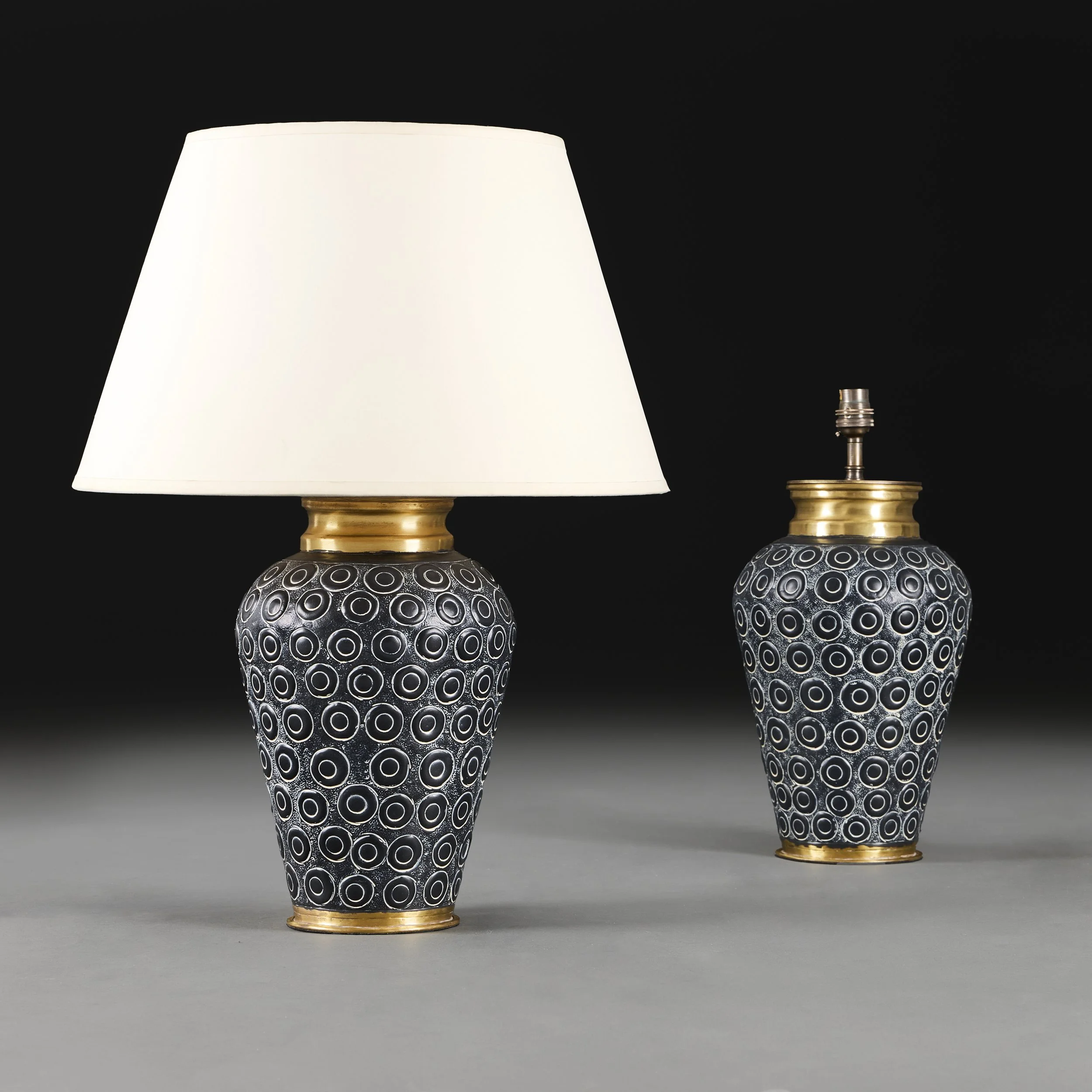 A PAIR OF PUNCHED METAL BALUSTER LAMPS