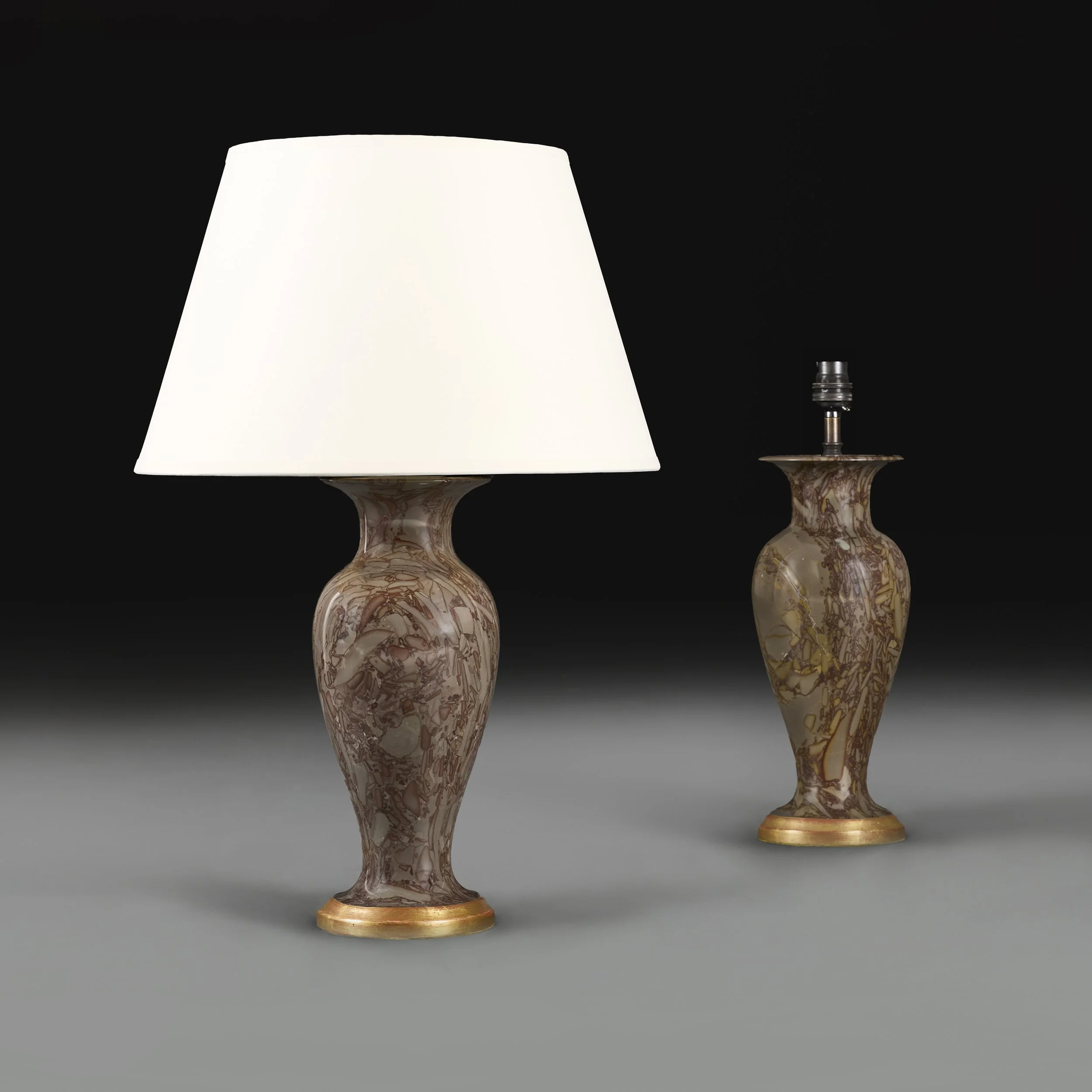 A PAIR OF BRECCIA MARBLE URN LAMPS