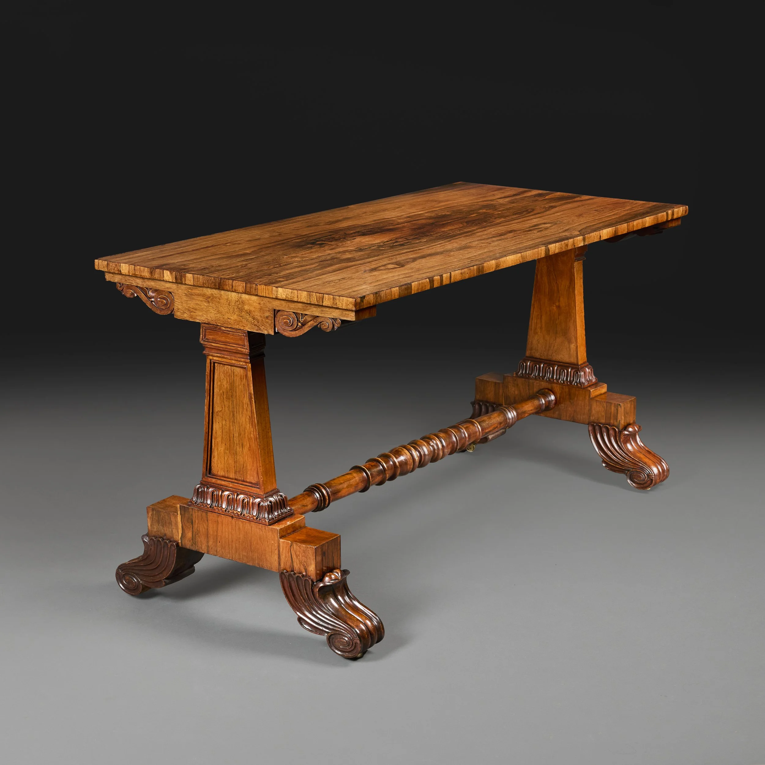 A REGENCY ROSEWOOD LIBRARY TABLE