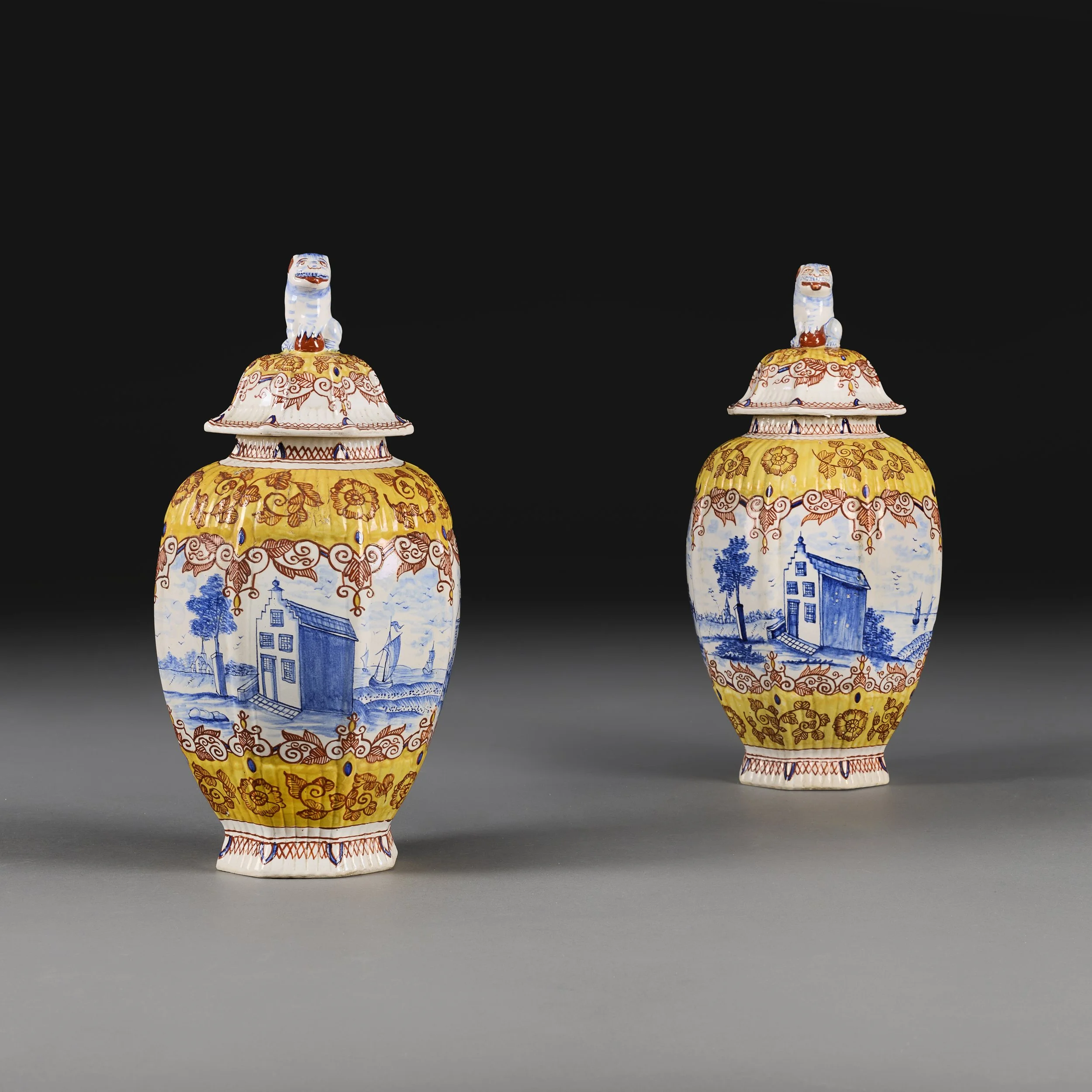A RARE PAIR OF MID 19TH C POLYCHROME DEFLT VASES