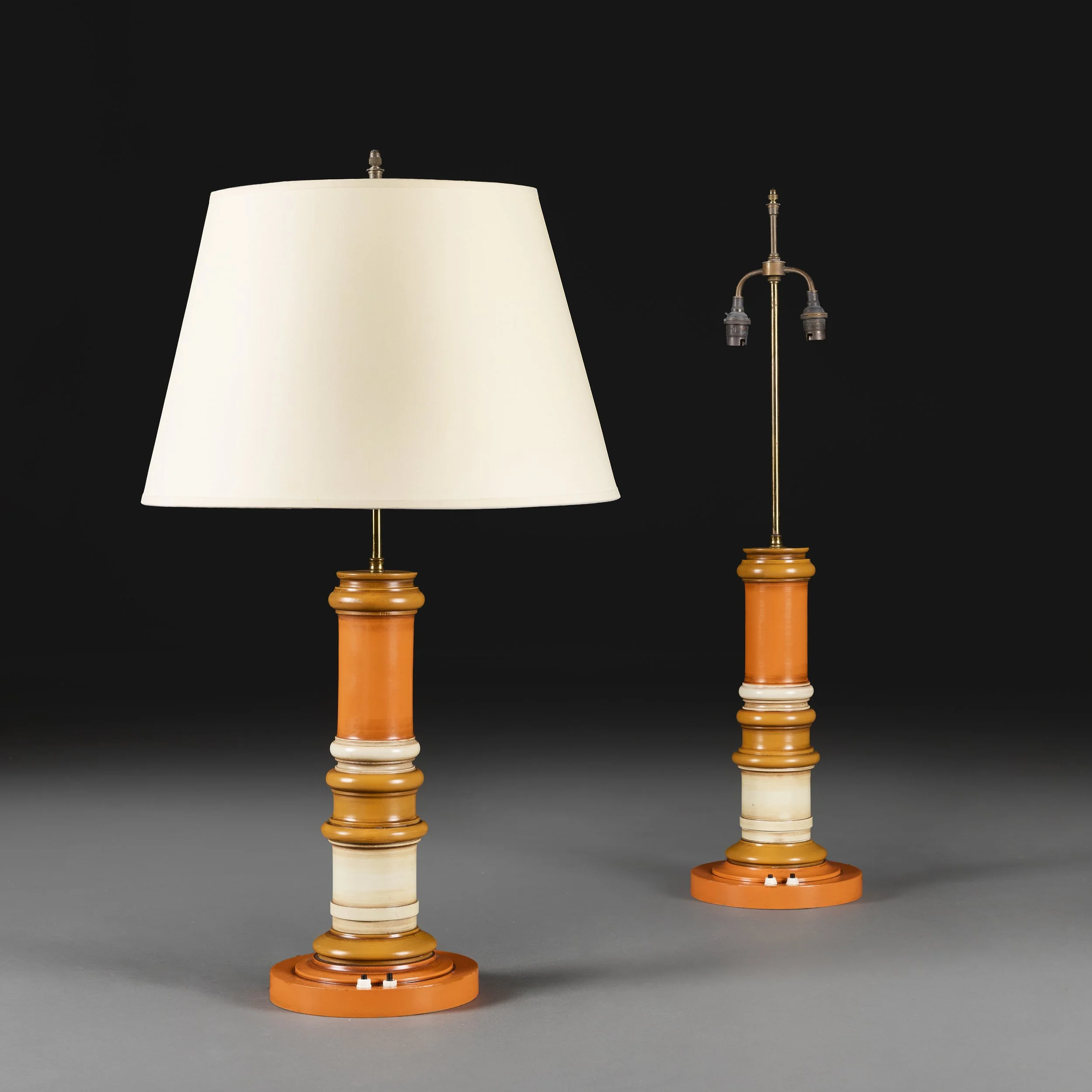 A PAIR OF INDIAN PAINTED COLUMN LAMPS