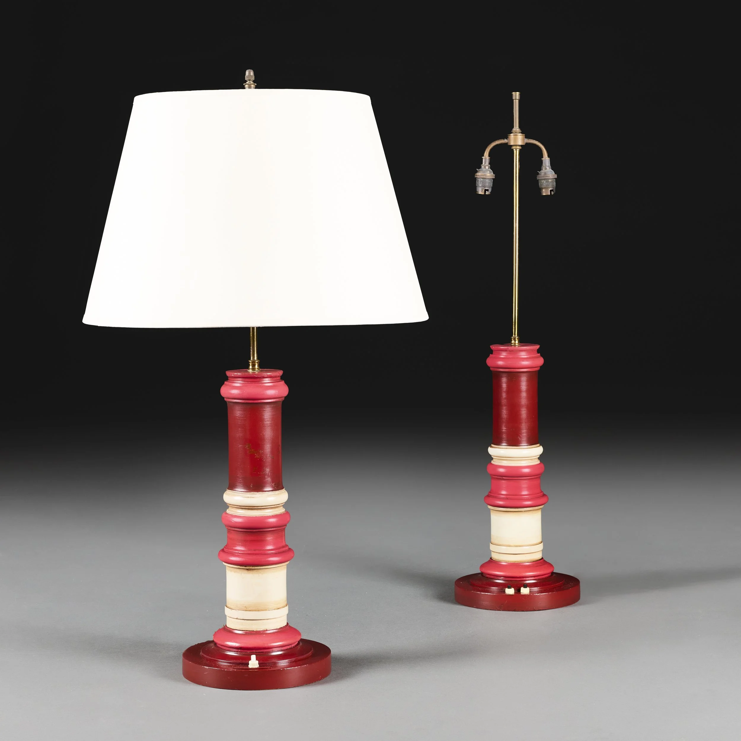 A PAIR OF INDIAN PAINTED COLUMN LAMPS