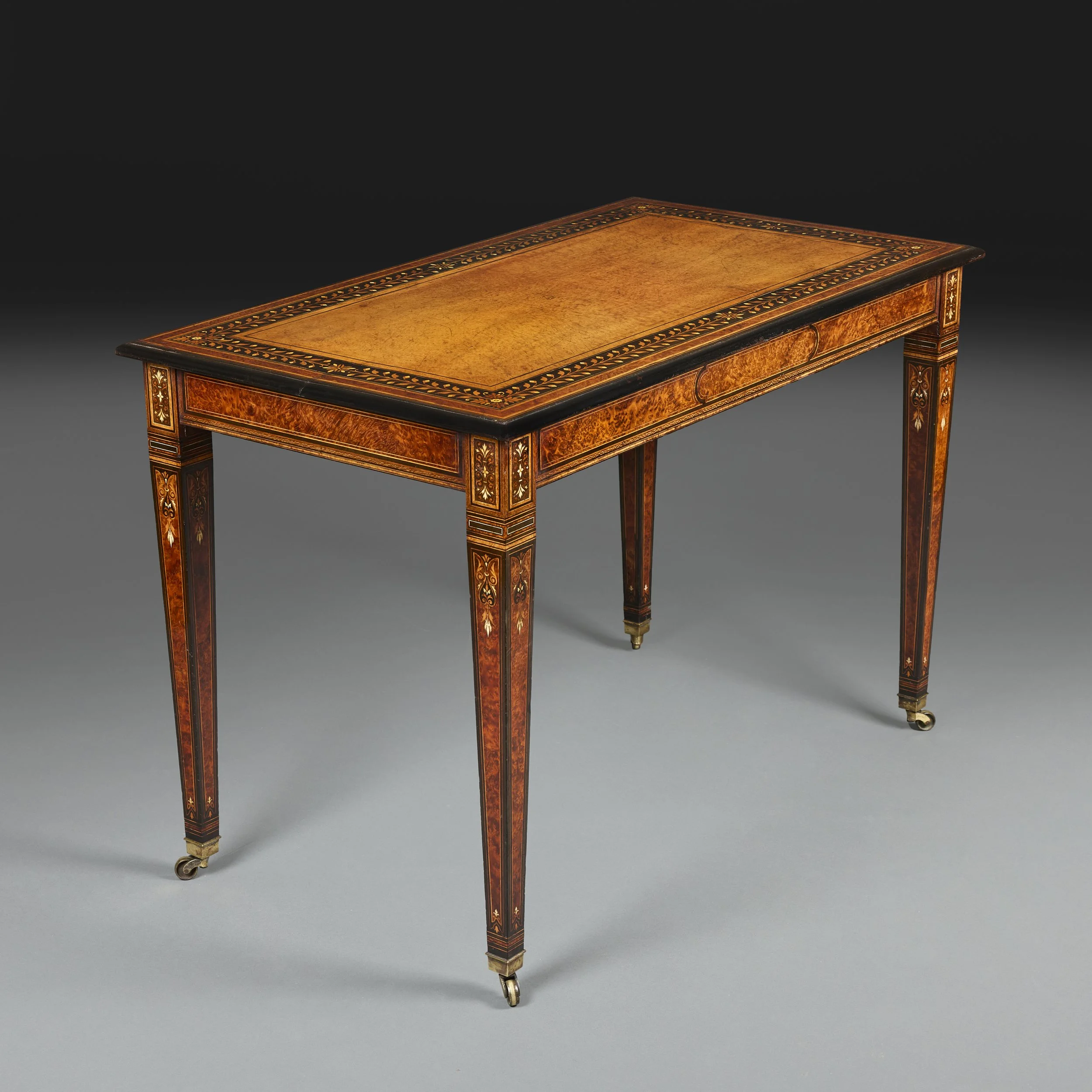 AN EXCEPTIONAL 19TH CENTURY AMBOYNA TABLE BY HOLLAND AND SONS