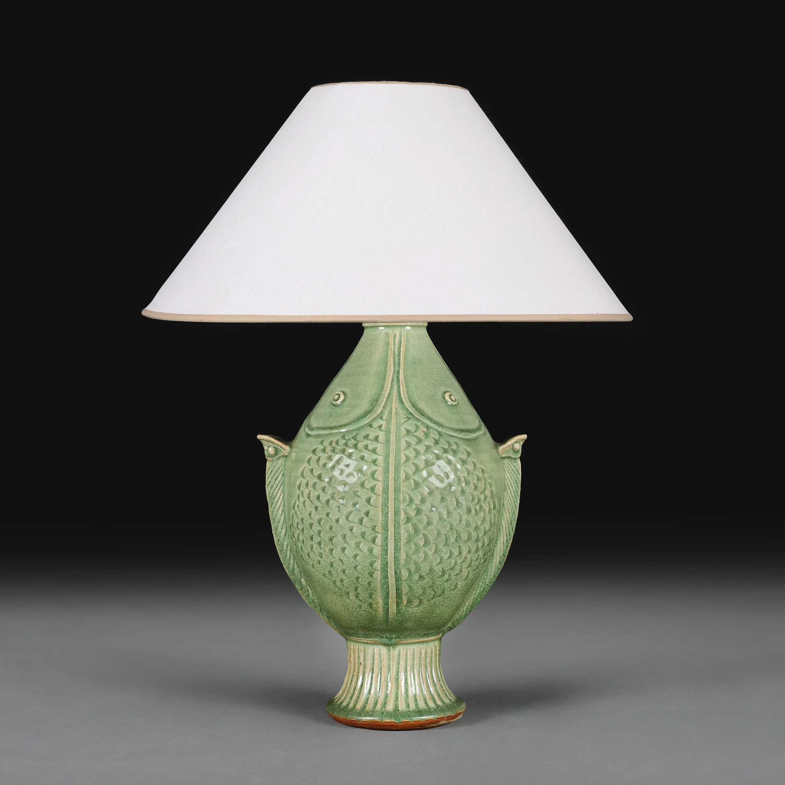 A CHINESE CELADON FISH VASE AS A LAMP