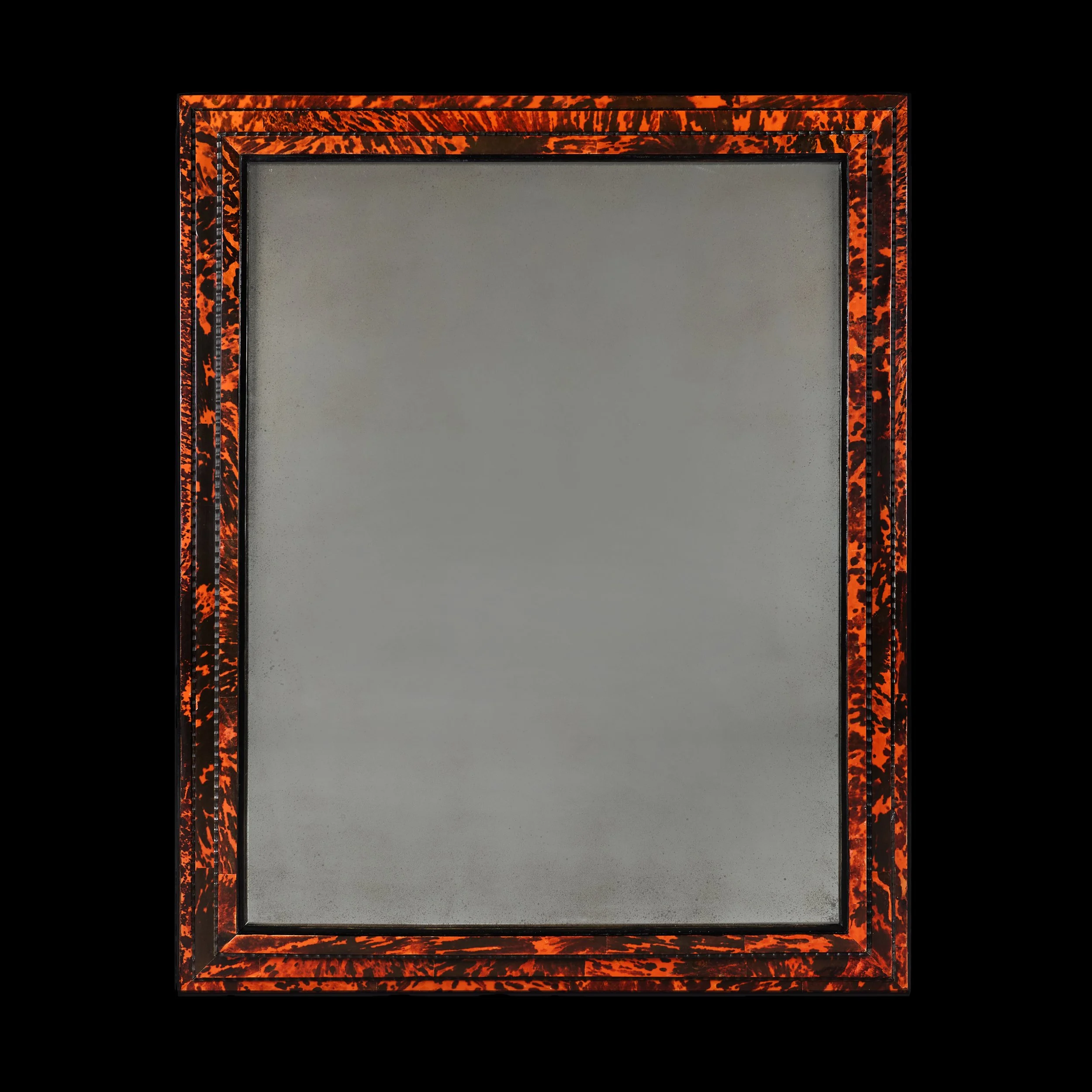 A LARGE FAUX TORTOISESHELL RIPPLE MOULD MIRROR