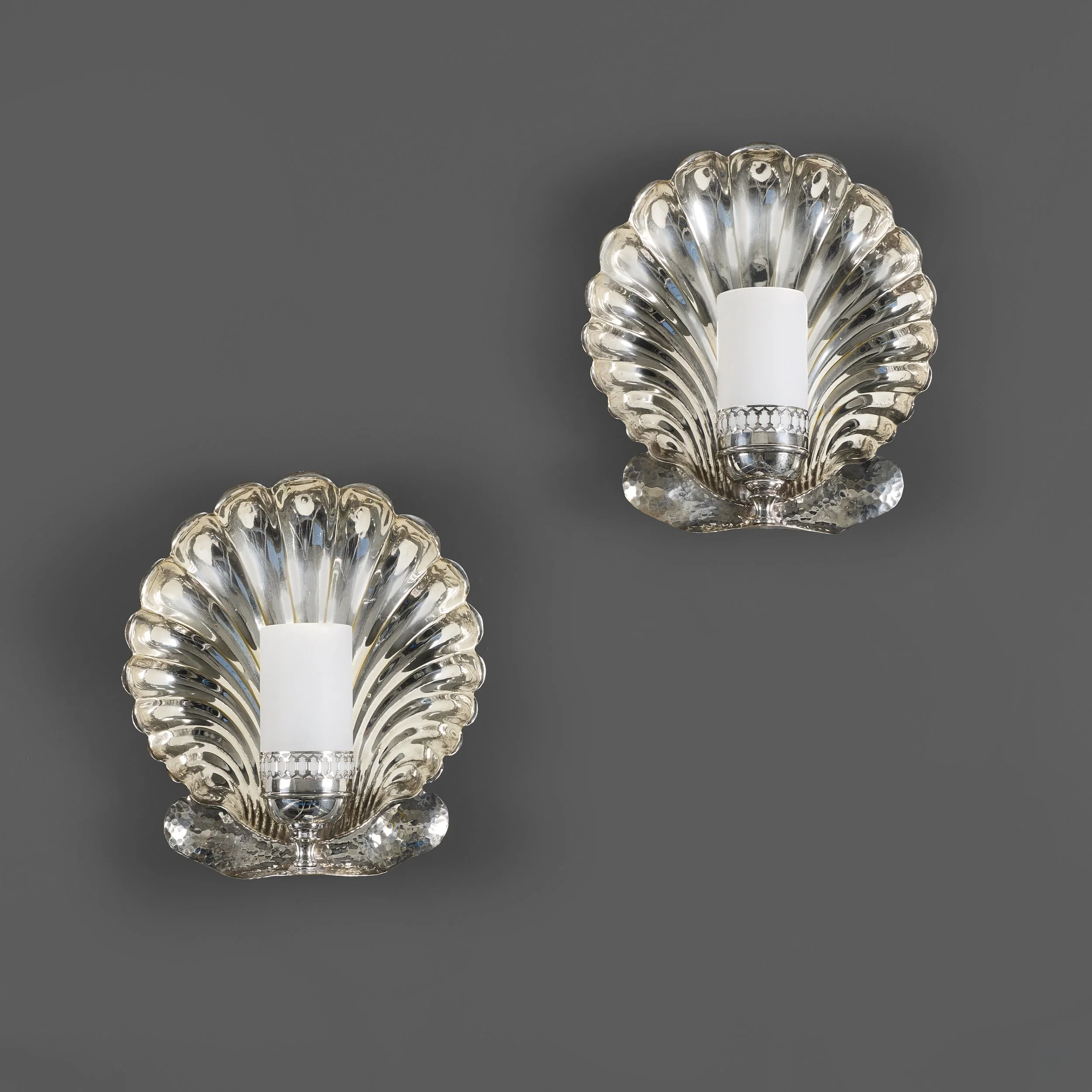 A PAIR OF SILVER-PLATED SCALLOP WALL SCONCES