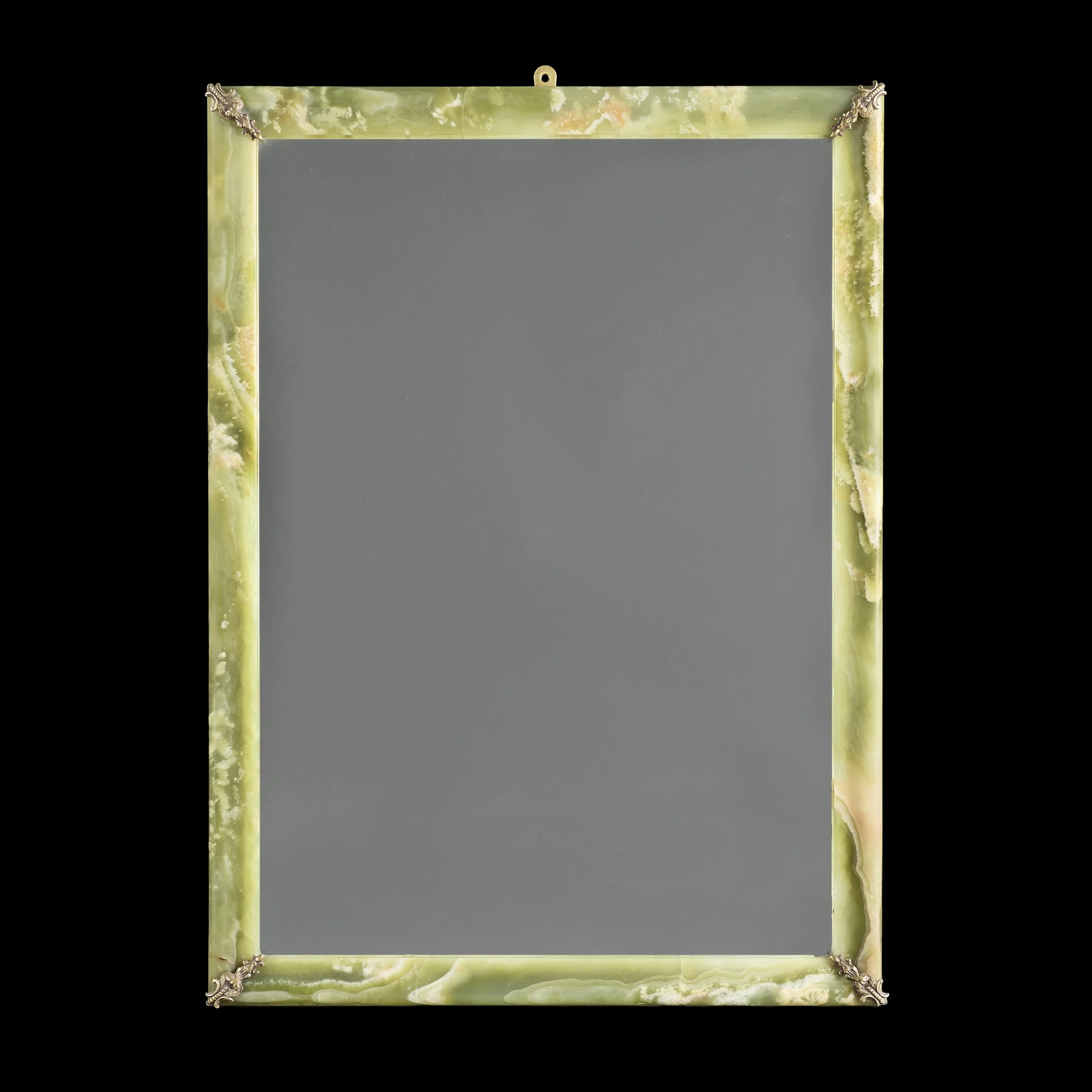 A GREEN ONYX MIRROR