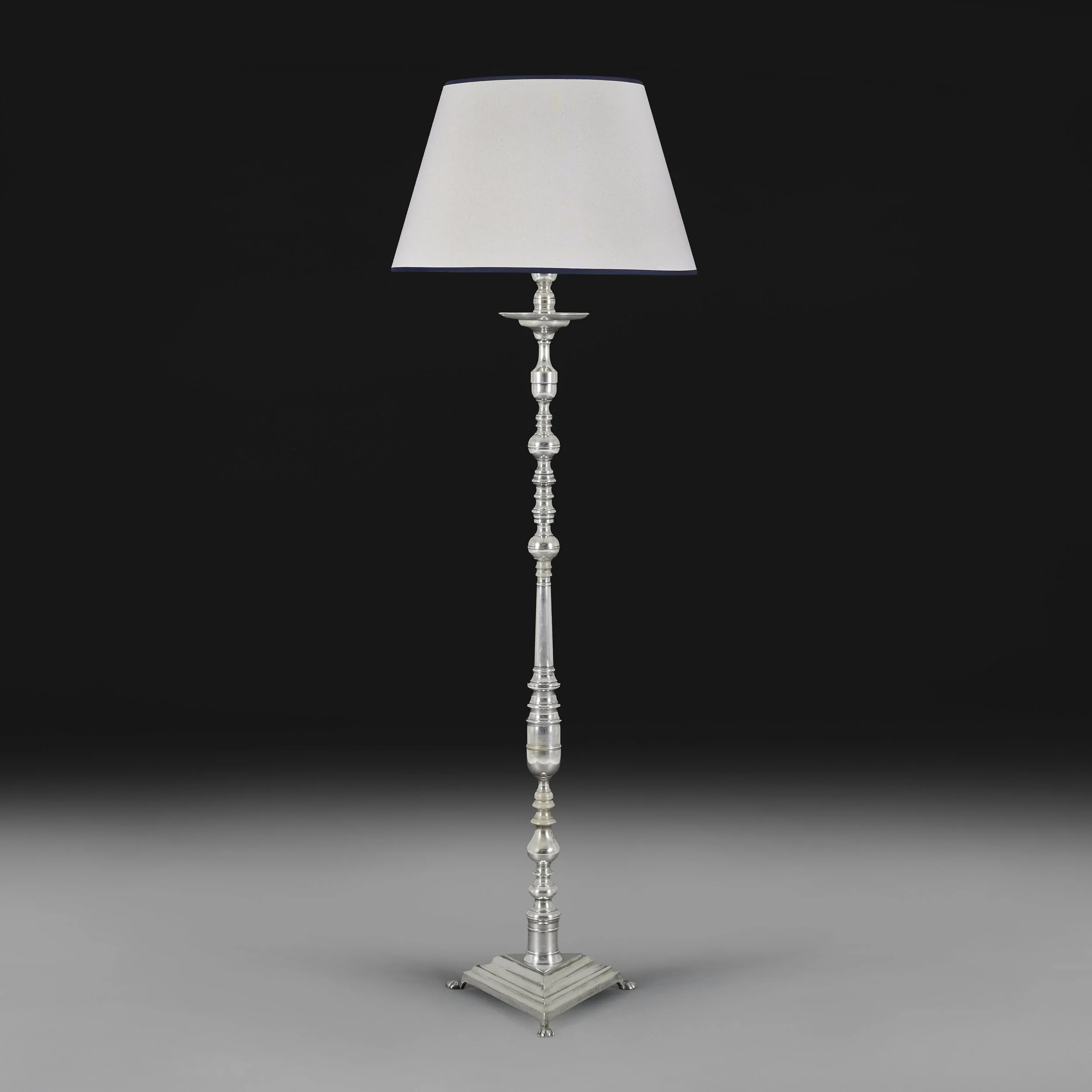 A SPANISH SILVER PLATED FLOOR LAMP