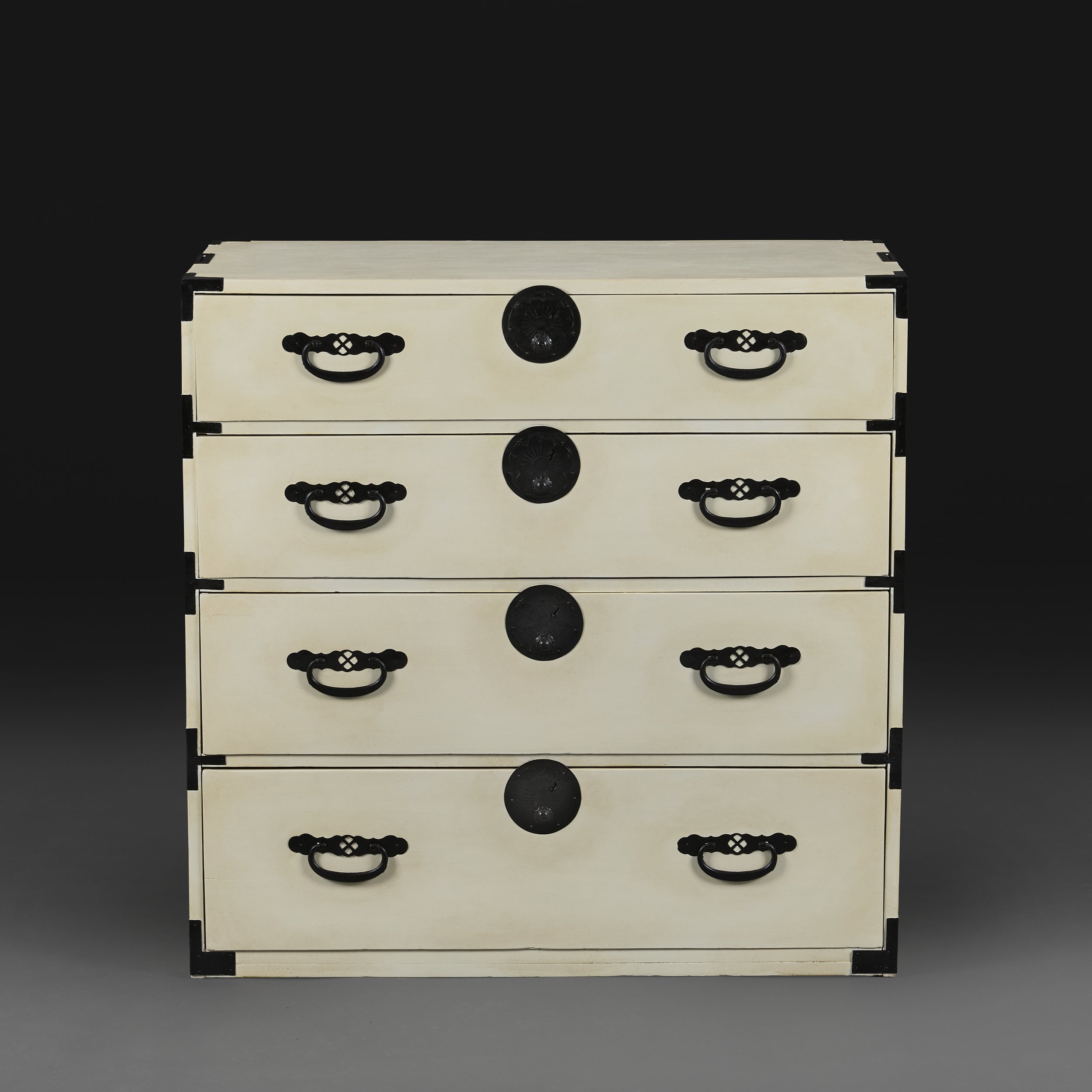 AN IVORY PAINTED JAPANESE TANSU