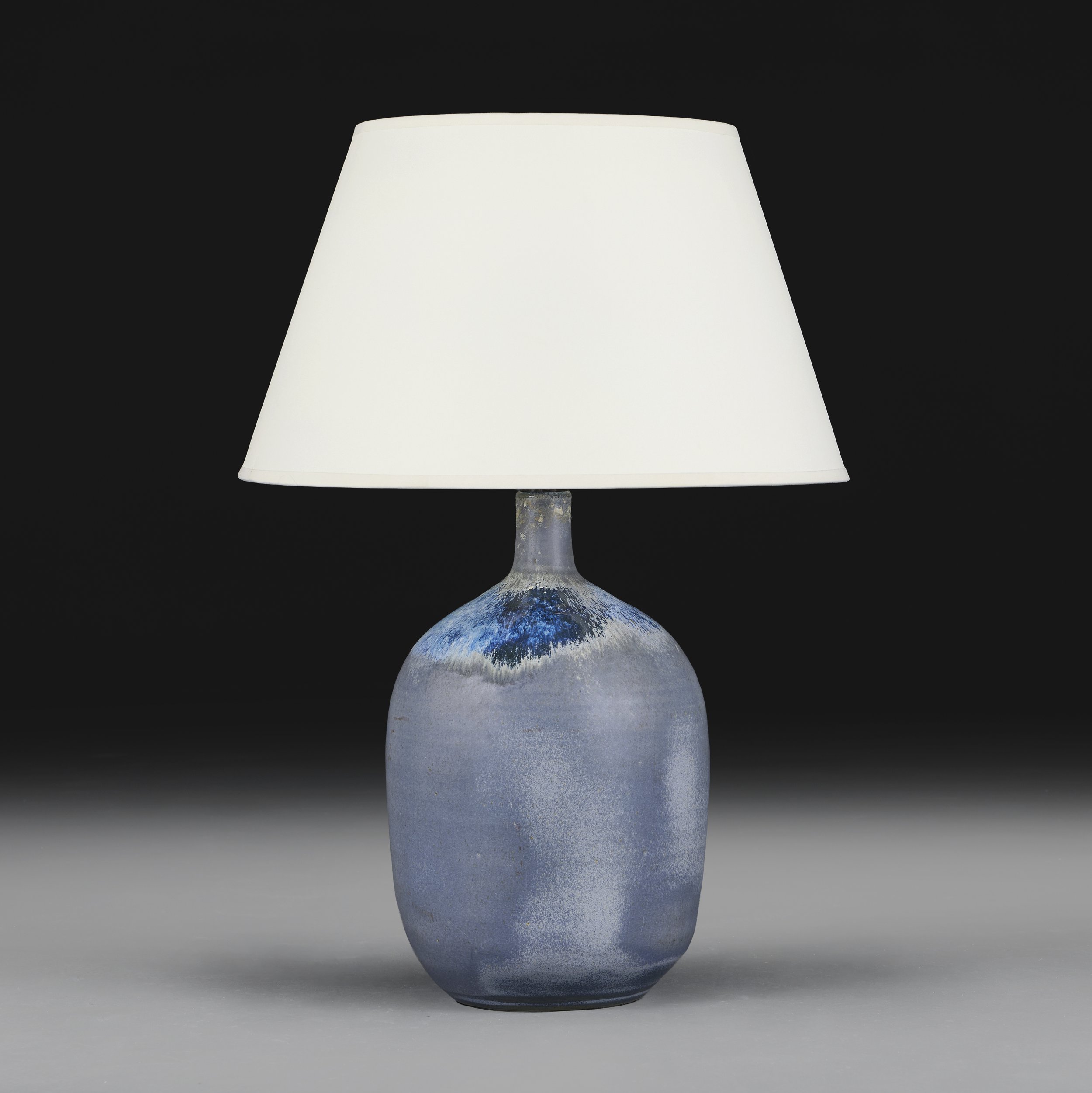 A BLUE ART POTTERY DRIP GLAZE VASE AS A LAMP
