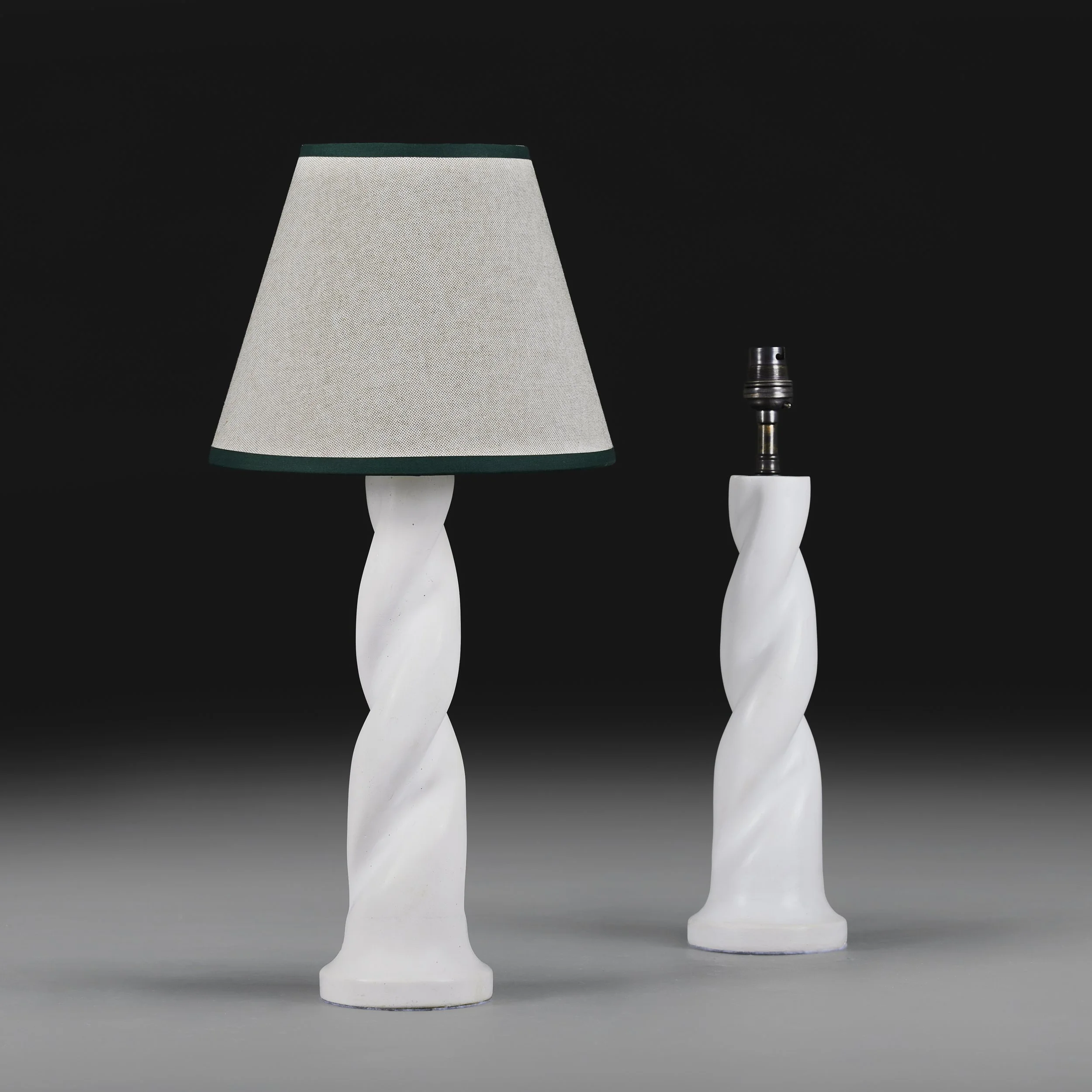 A PAIR OF SPIRAL TWIST PLASTER LAMPS