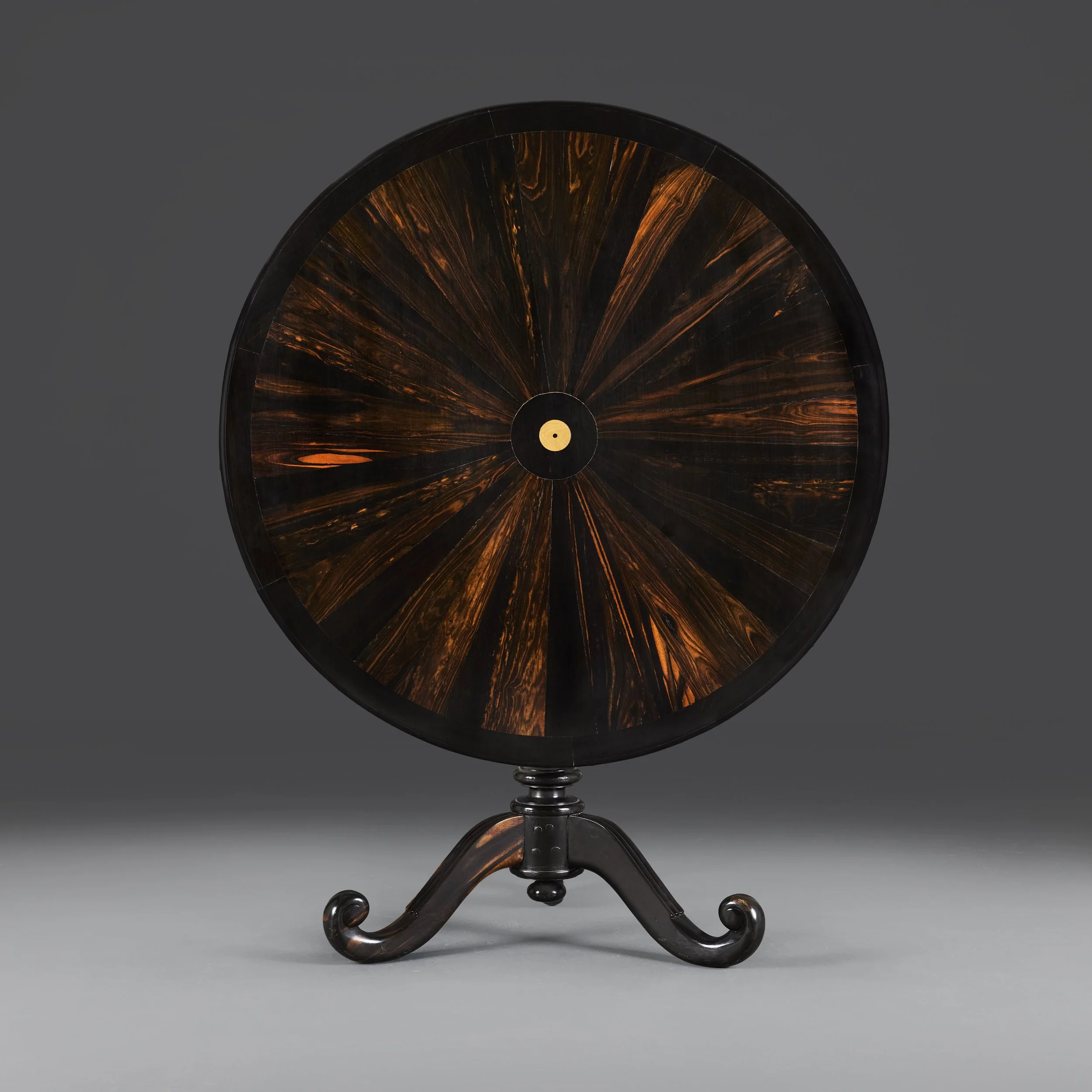 AN EBONY ANGLO-SINHALESE CENTRE TABLE