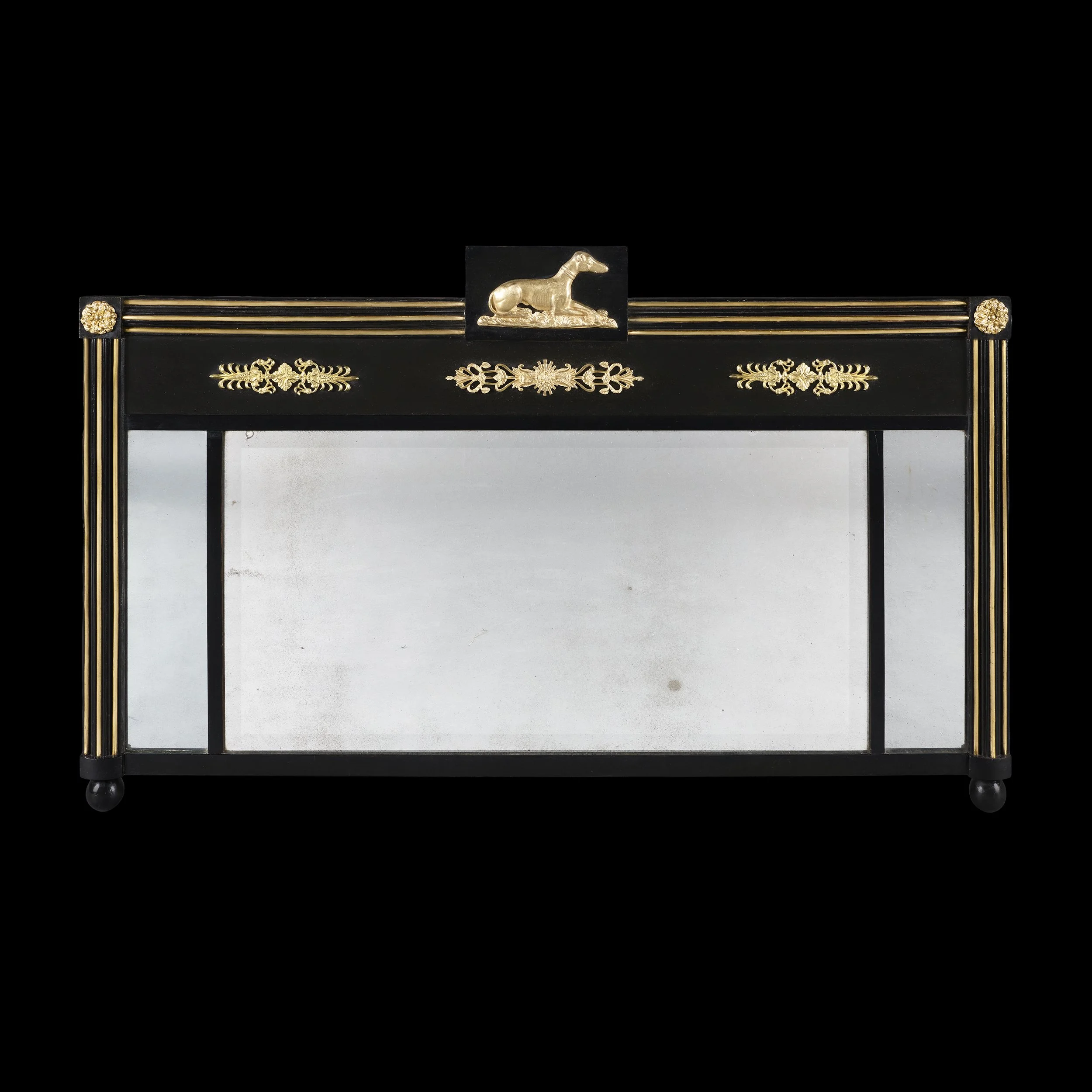 AN EBONISED REGENCY OVERMANTLE MIRROR
