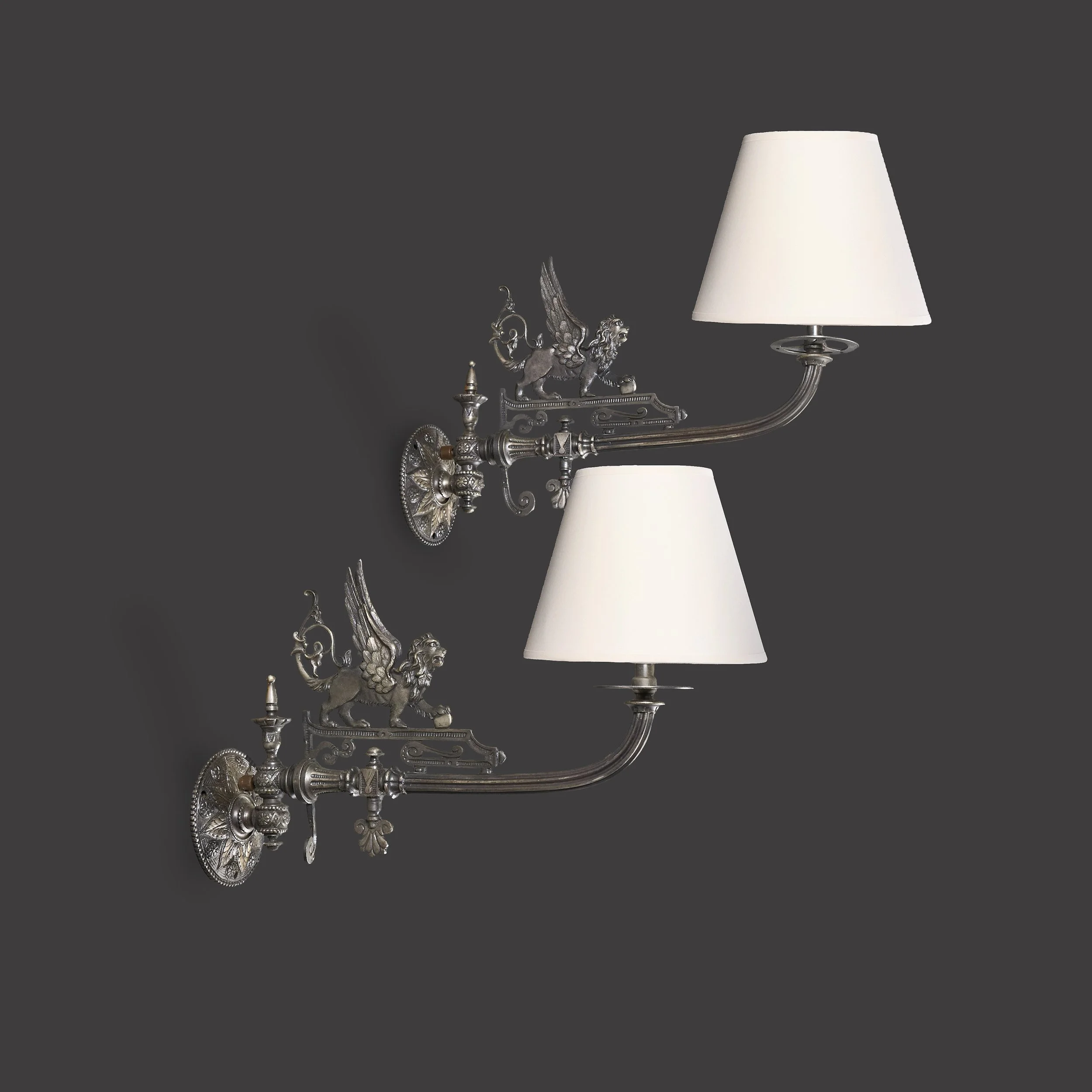 A PAIR OF EDWARDIAN STEEL WALL LIGHTS