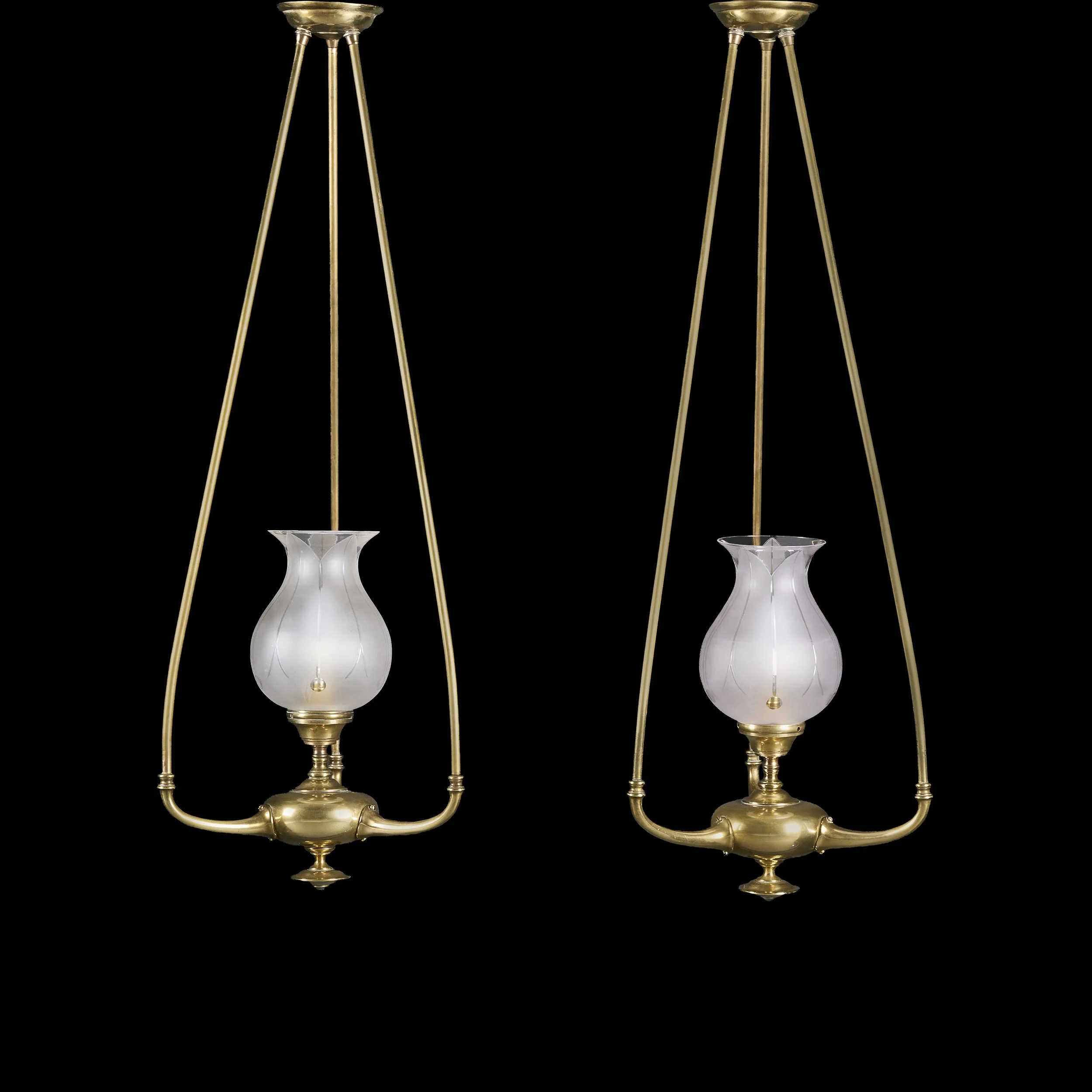 AN UNUSUAL PAIR OF EDWARDIAN BRASS HANGING LIGHTS