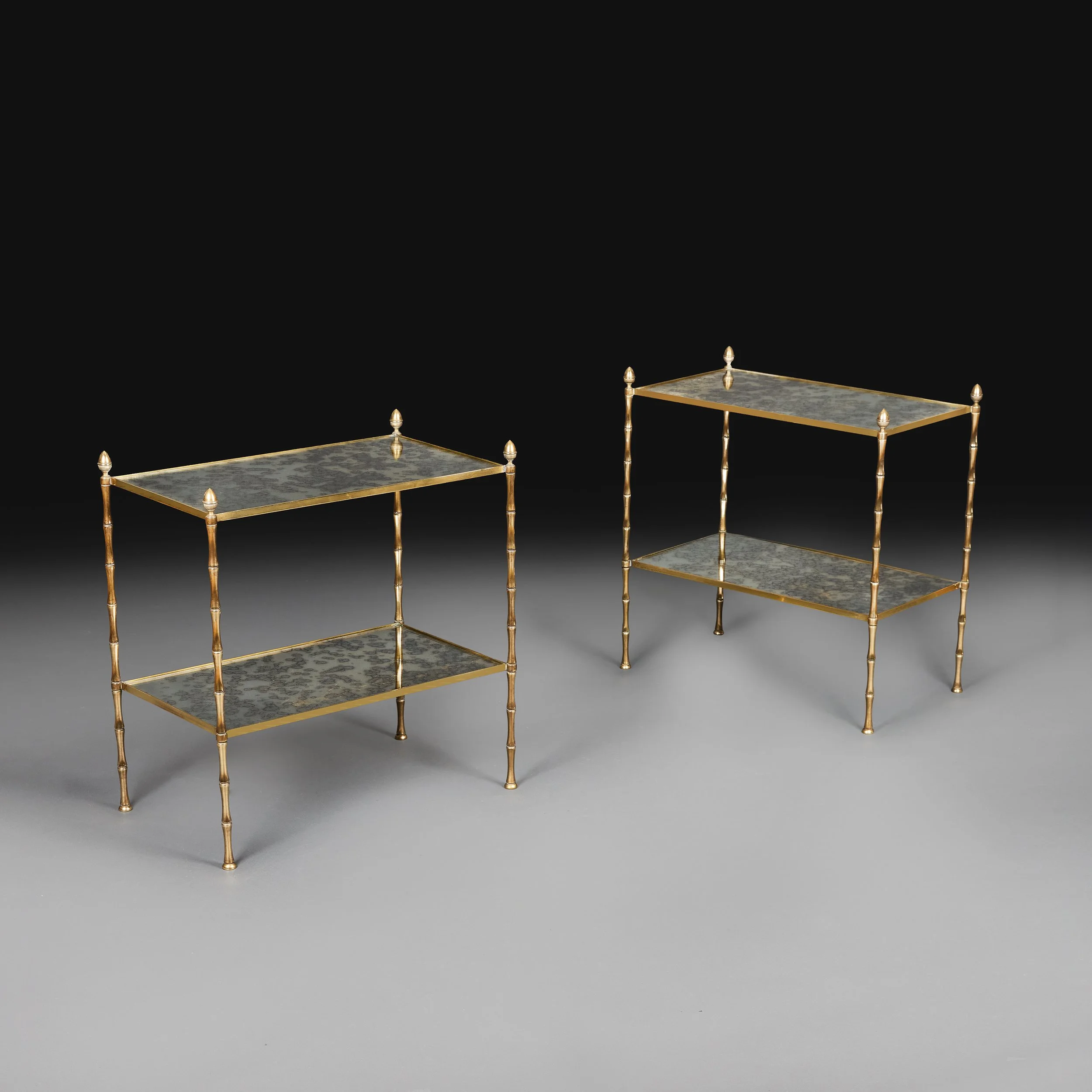 A PAIR OF FAUX BAMBOO ETAGERES BY MAISON BAGUES