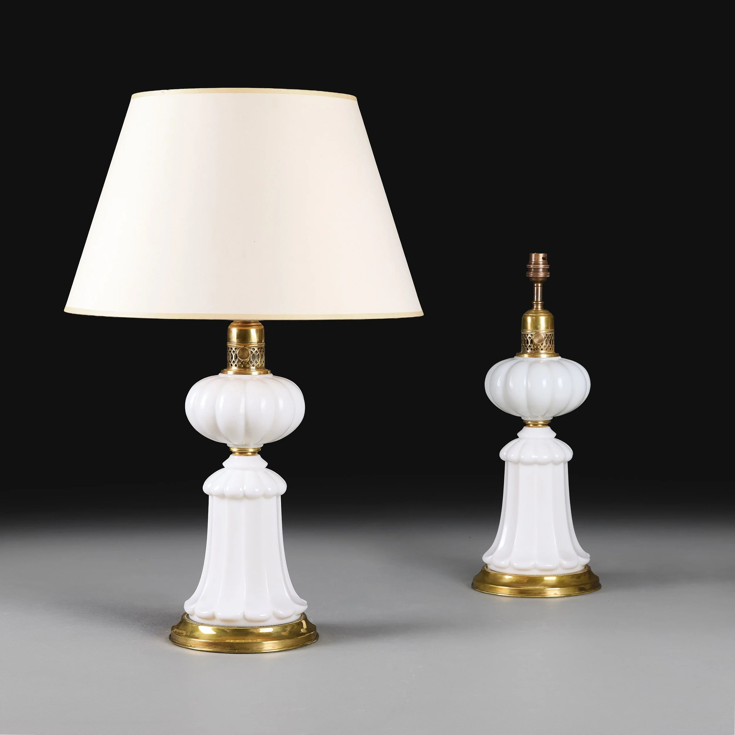 A PAIR OF EDWARDIAN WHITE OPALINE GLASS LAMPS