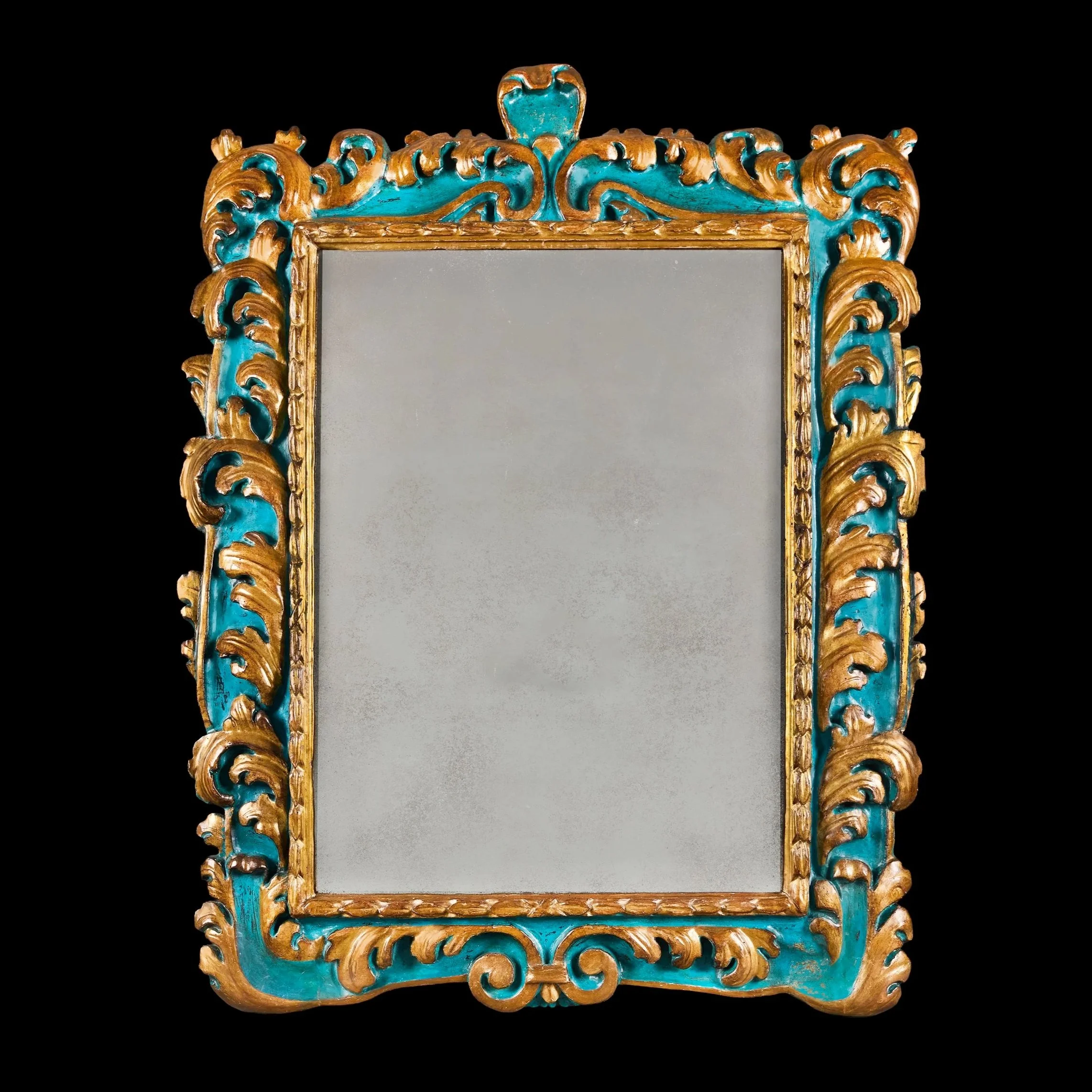 A SICILIAN 18TH CENTURY BAROQUE MIRROR